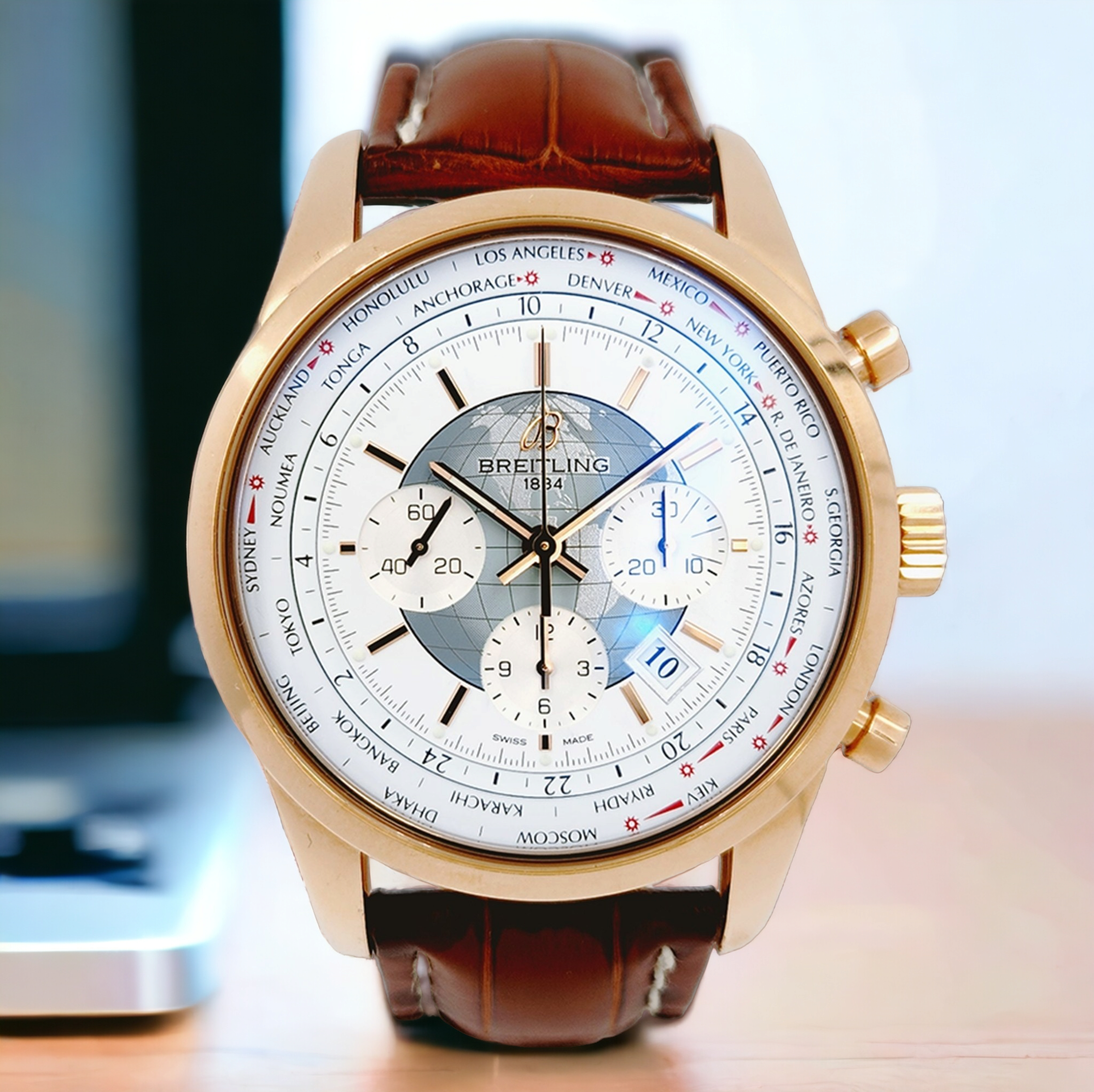 *Men's Breitling 46mm Transocean Watch in 18K Rose Gold with Brown Leather Band and White Chronograph Dial. (Pre-Owned)