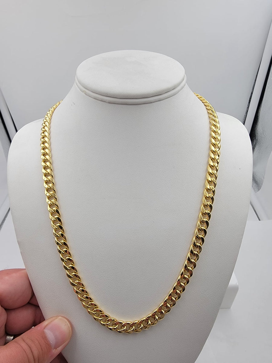 14k yellow gold cuban link chain, 22 in , 6mm wide, weight 30.4 grams.