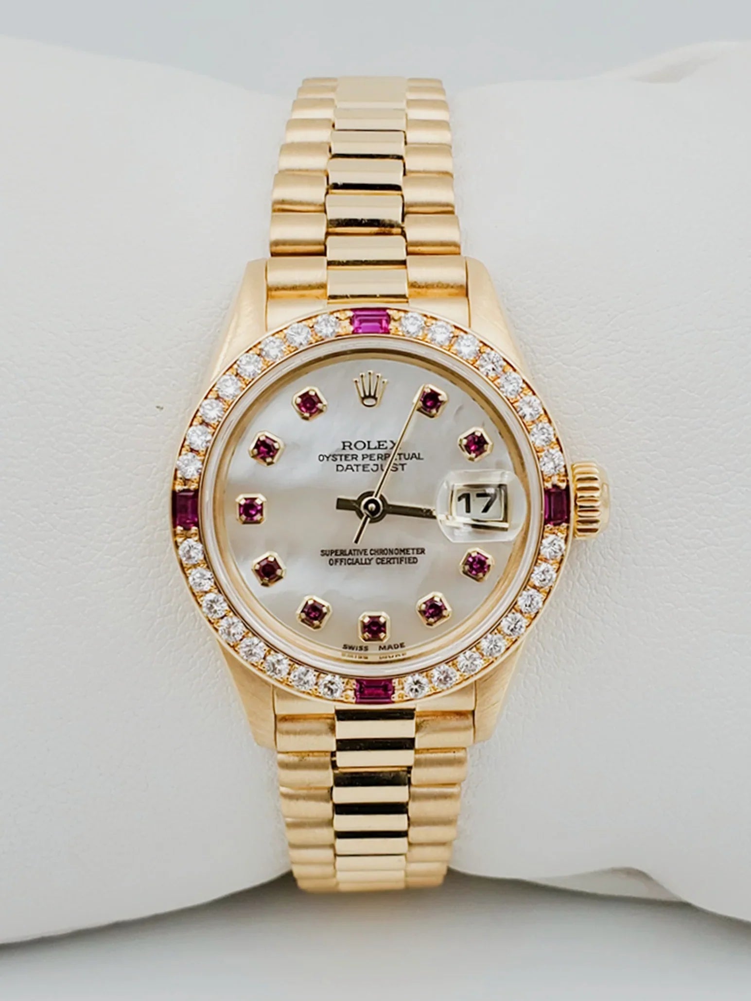 Ladies Rolex 26mm Presidential 18K Solid Yellow Gold Watch with Mother of Pearl Ruby Dial and Diamond Bezel. (UNWORN 69178)