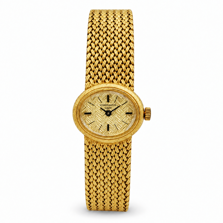 Ladies Constantin Grey 19mm x 22mm Vintage 14K Yellow Gold Watch with Gold Oval Dial and Basketweave Bezel. (Pre-Owned)