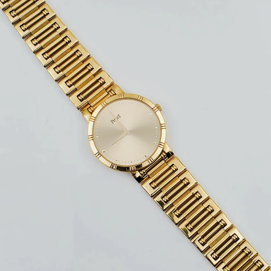 *Men's Piaget 31mm Dancer Vintage Solid 18K Yellow Gold Band Watch with Champagne Dial. (Pre-Owned)