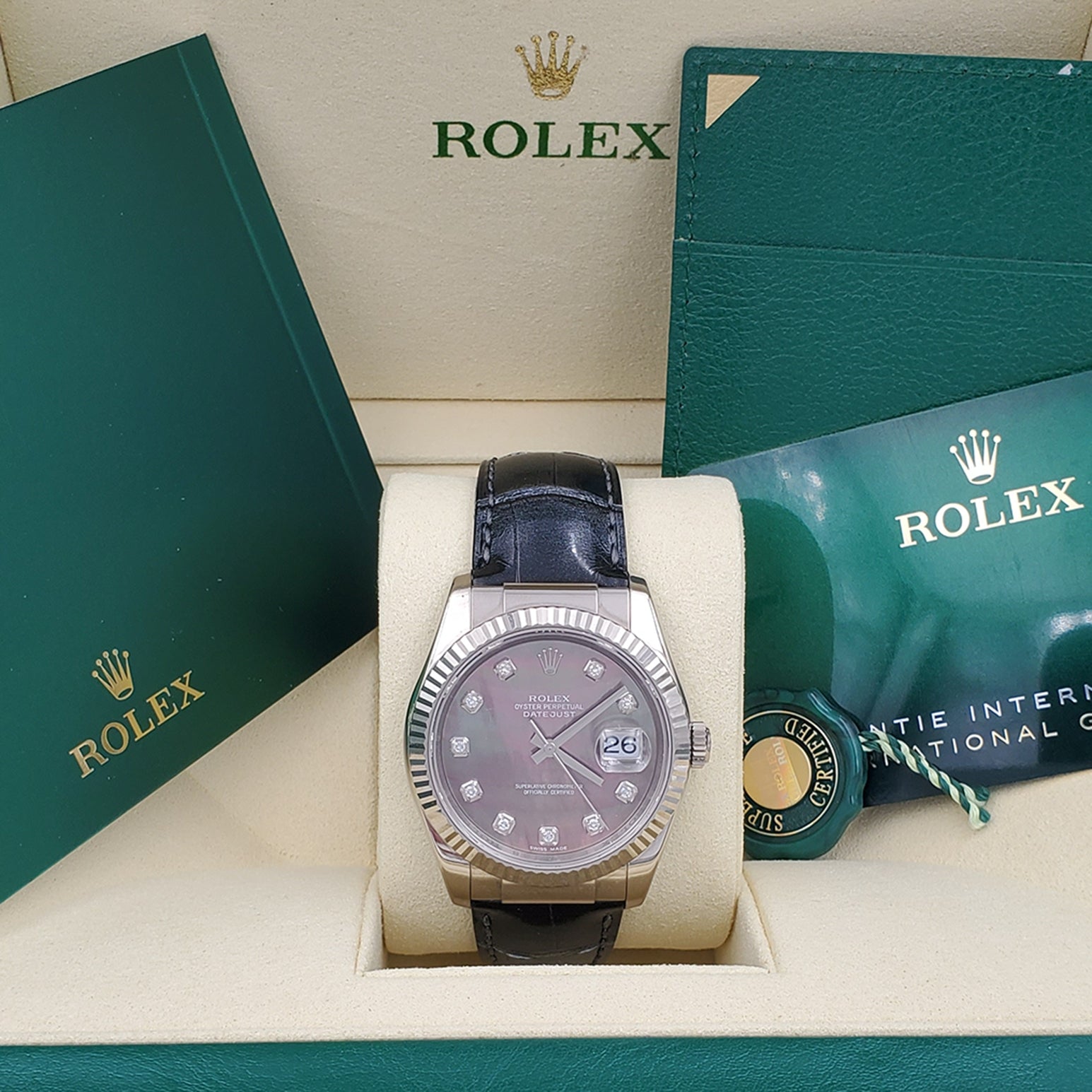 Men's Rolex 36mm DateJust White Gold Watch with Mother of Pearl Diamond Dial and Black Leather Band. (NEW 116139)