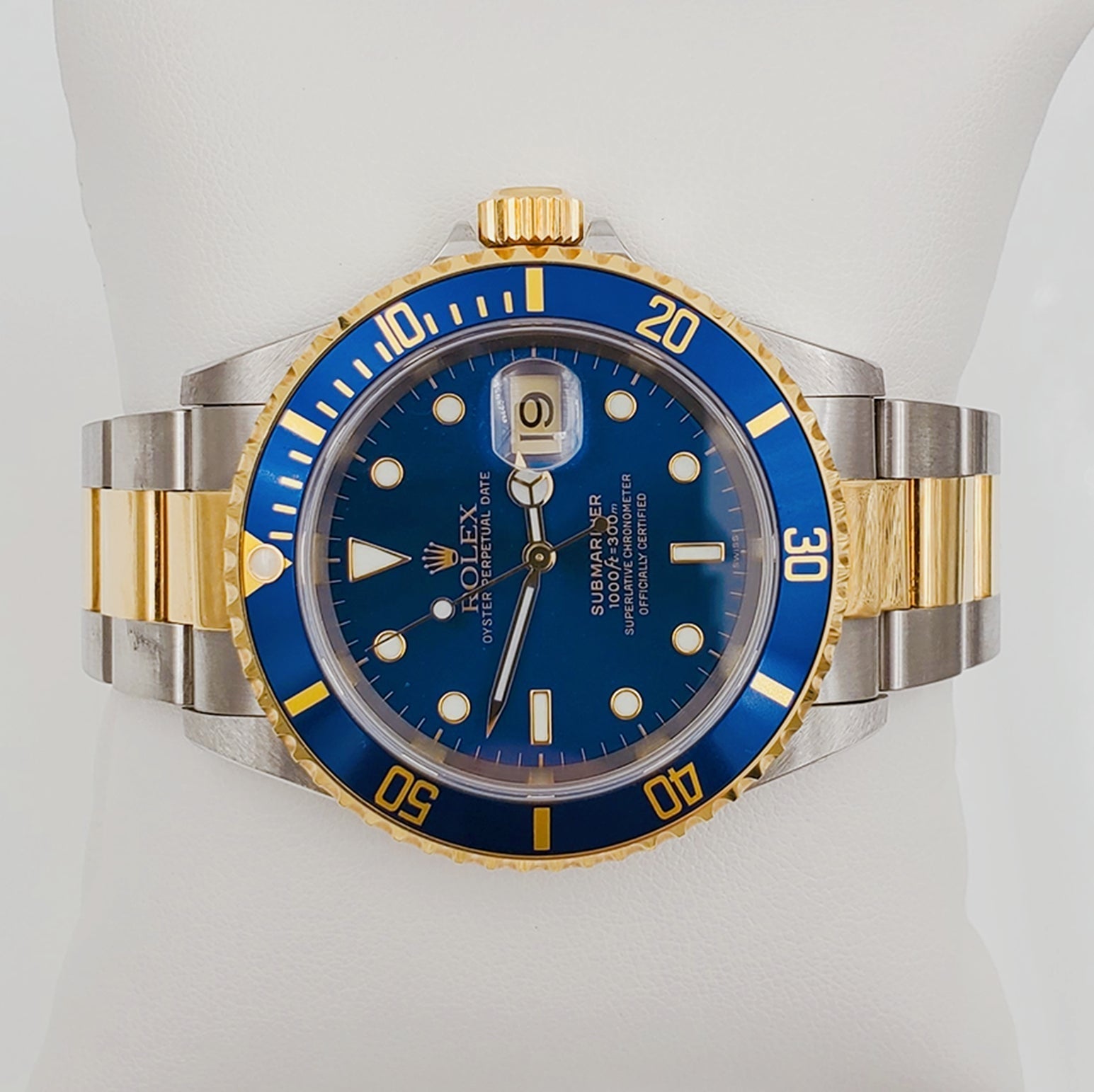 2004 Men's Rolex 40mm Submariner Oyster Perpetual Two Tone 18K Yellow Gold / Stainless Steel Watch with Blue Dial and Blue Bezel. (Pre-Owned 16613)