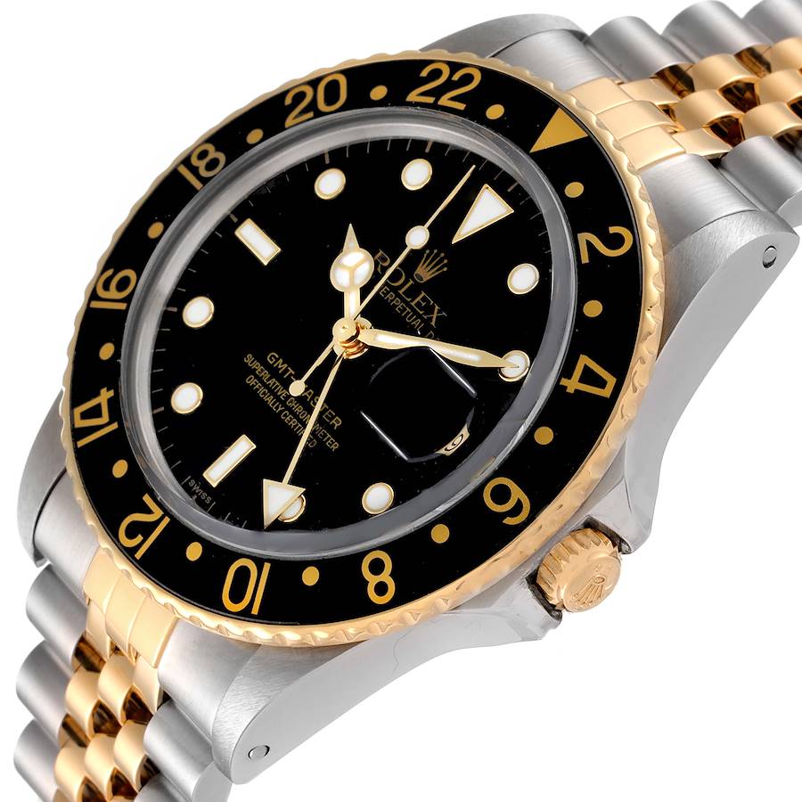 1985 Men's Rolex 38mm GMT Vintage Master 18K Gold / Stainless Steel Two Tone Watch with Black Bezel and Black Dial. (Pre-Owned 16753)