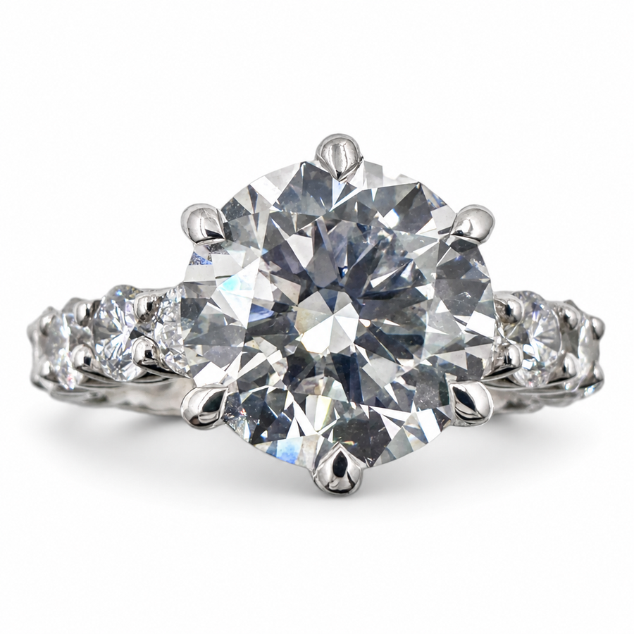 14k White Gold Ring with 3.02 Ct. Lab Grown Round Diamond and 2.48 Ct. Side Diamonds. (Size 6.75)