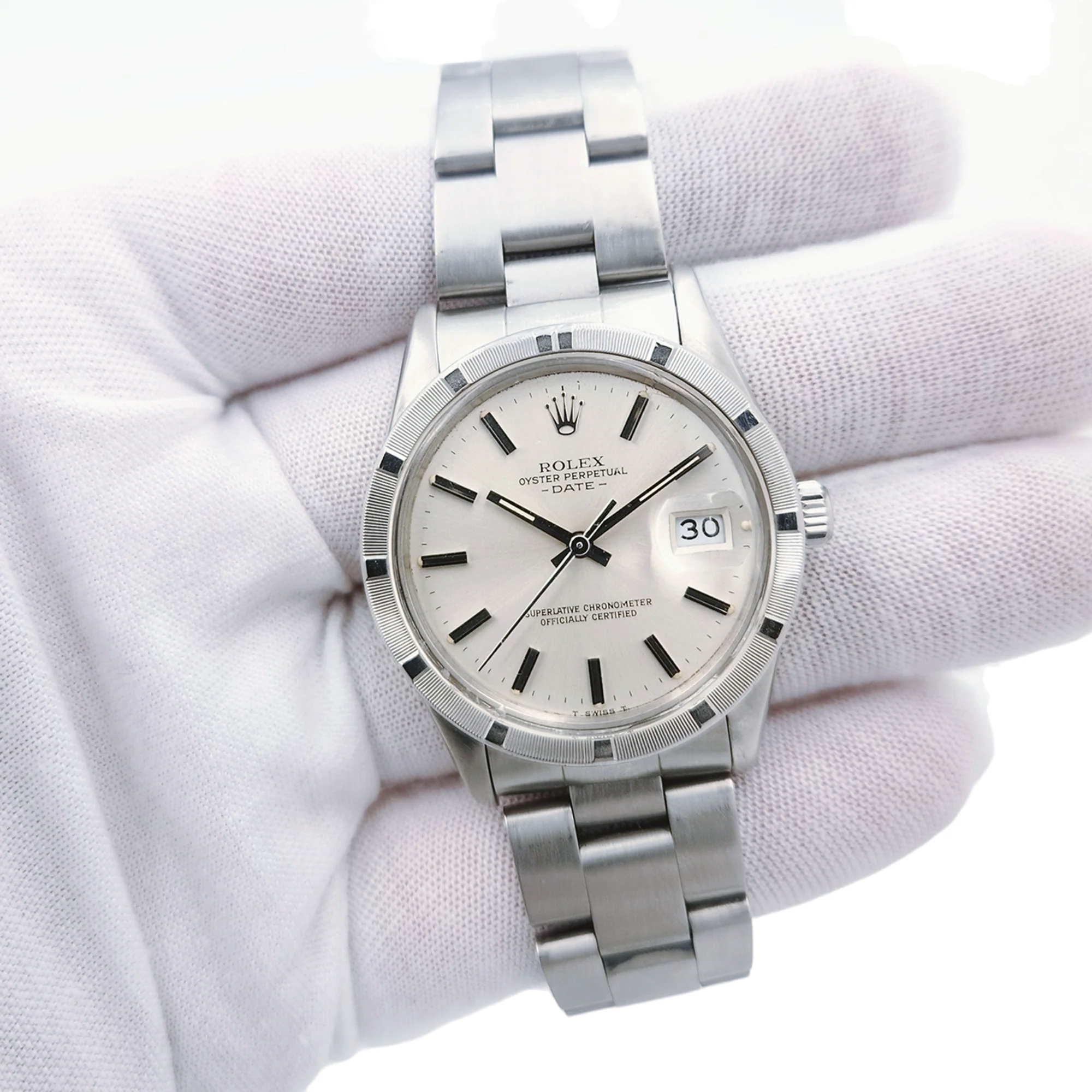1983 Men's Rolex 34mm Date - Vintage Stainless Steel Watch with Silver Dial and Engine Turned Bezel. (Pre-Owned 15010)