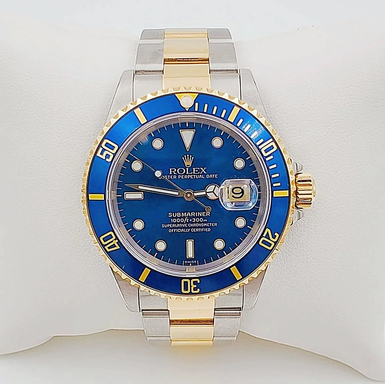 1991 Men's Rolex 40mm Submariner Oyster Perpetual Two Tone 18K Yellow Gold / Stainless Steel Watch with Blue Dial and Blue Bezel. (Pre-Owned 16613)