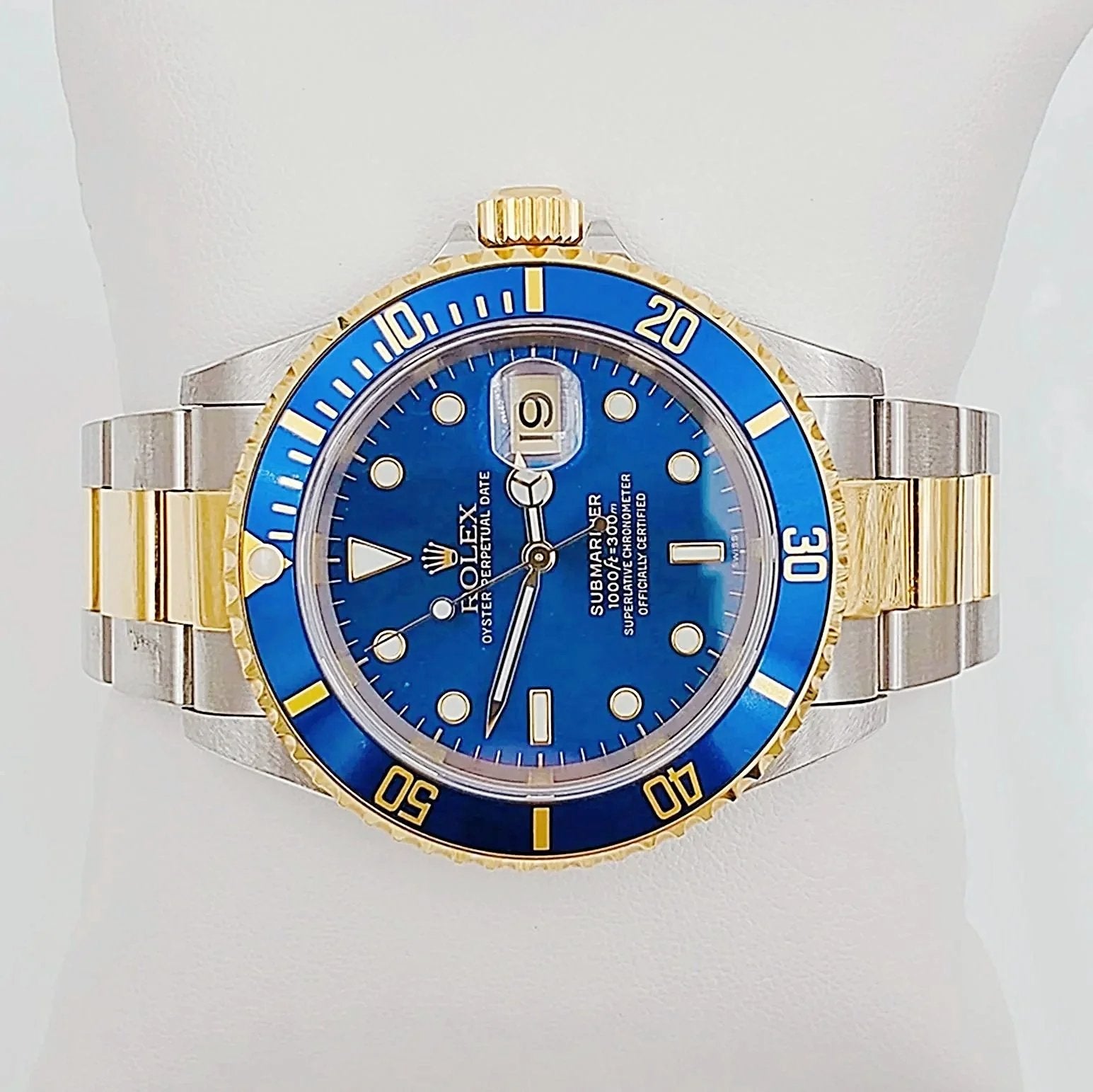 1991 Men's Rolex 40mm Submariner Oyster Perpetual Two Tone 18K Yellow Gold / Stainless Steel Watch with Blue Dial and Blue Bezel. (Pre-Owned 16613)