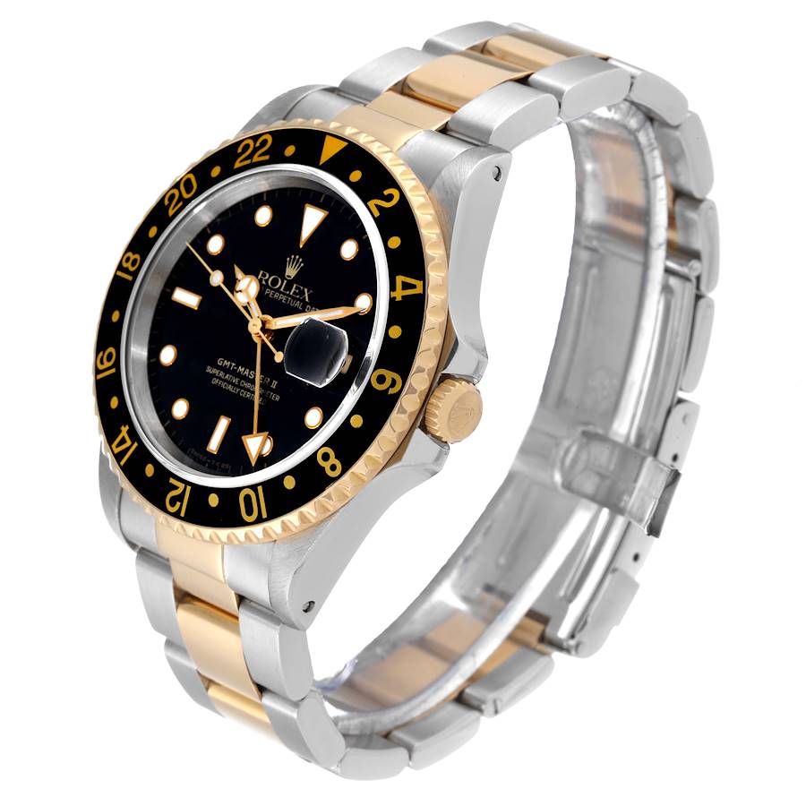 1995 Men's Rolex 40mm GMT Master II Two Tone 18K Yellow Gold / Stainless Steel Watch with Black Bezel and Black Dial. (Pre-Owned 16713)