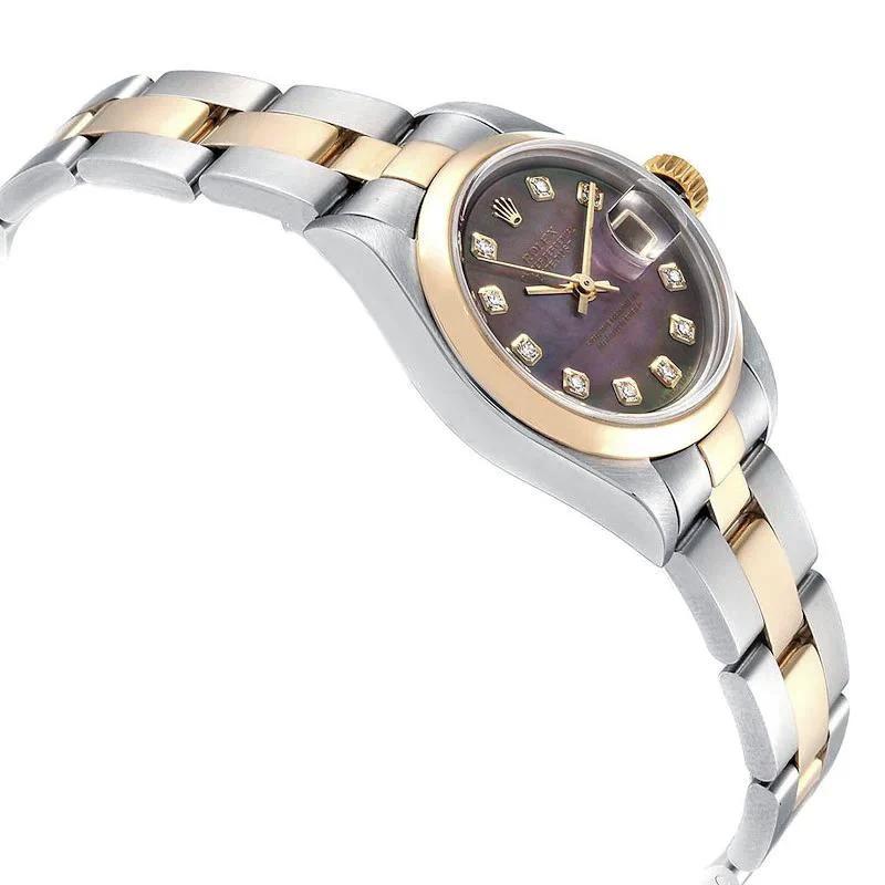 1999 Ladies Rolex 26mm DateJust Two Tone 18K Yellow Gold / Stainless Steel Watch with Mother of Pearl Diamond Dial and Smooth Bezel. (Pre-Owned 79163)