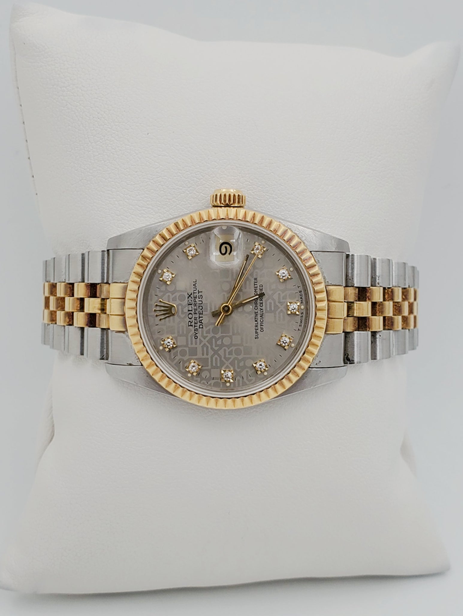 Ladies Rolex Midsize 31mm DateJust Two Tone 18K Yellow Gold / Stainless Steel Wristwatch w/ Silver Diamond Dial & Fluted Bezel. (Pre-Owned 682735)
