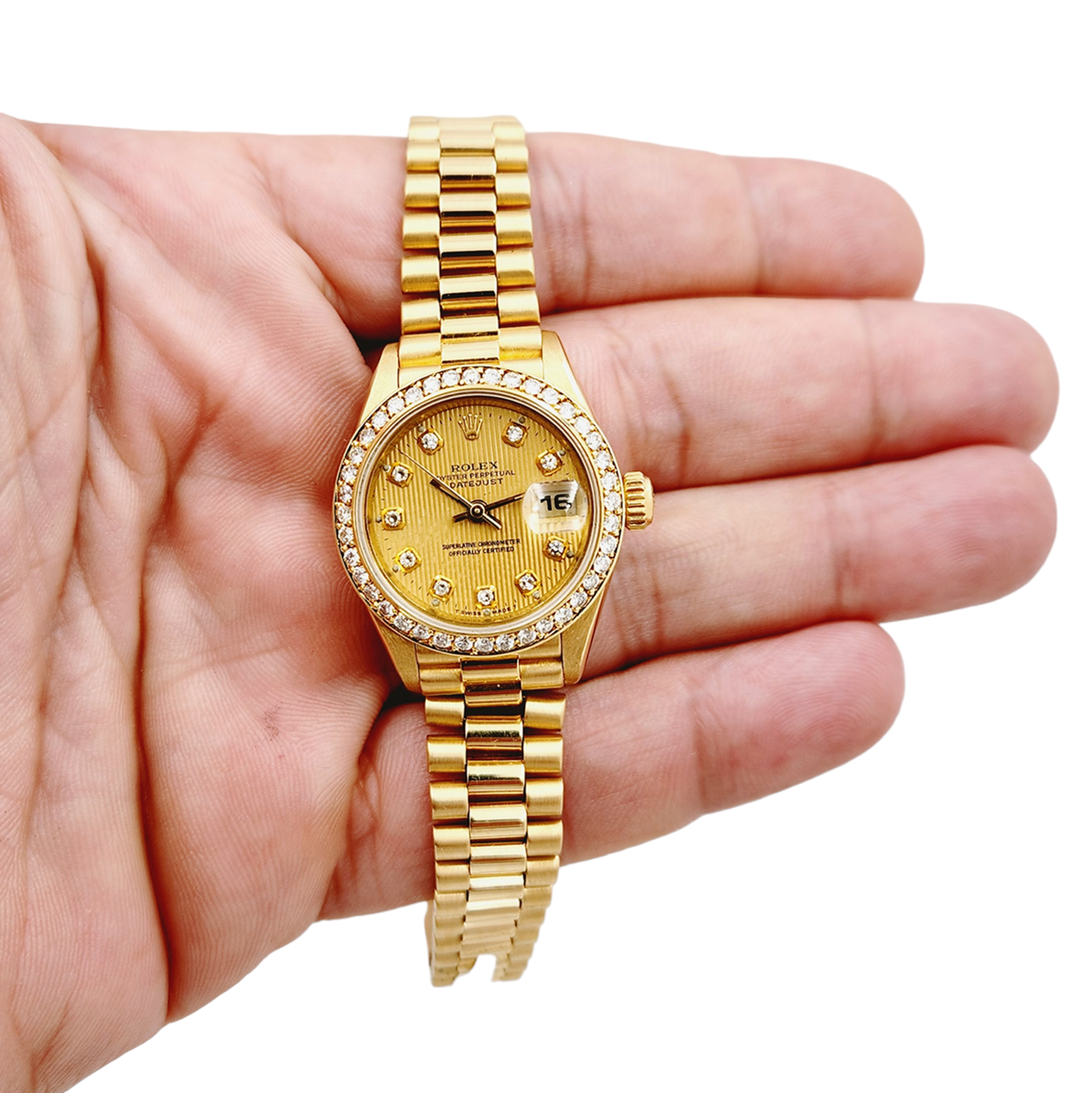Ladies Rolex 26mm Presidential 18K Solid Yellow Gold Watch with Gold Tapestry Diamond Dial and Diamond Bezel. (Pre-Owned 69174)