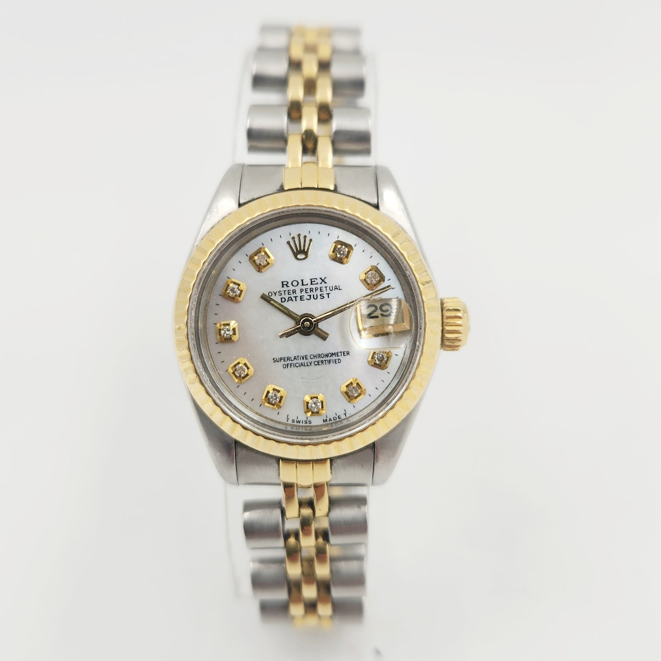 Ladies Rolex 26mm Vintage DateJust 18K Yellow Gold / Stainless Steel Two Tone Watch with White Diamond Dial and Fluted Bezel. (Pre-Owned 69173)