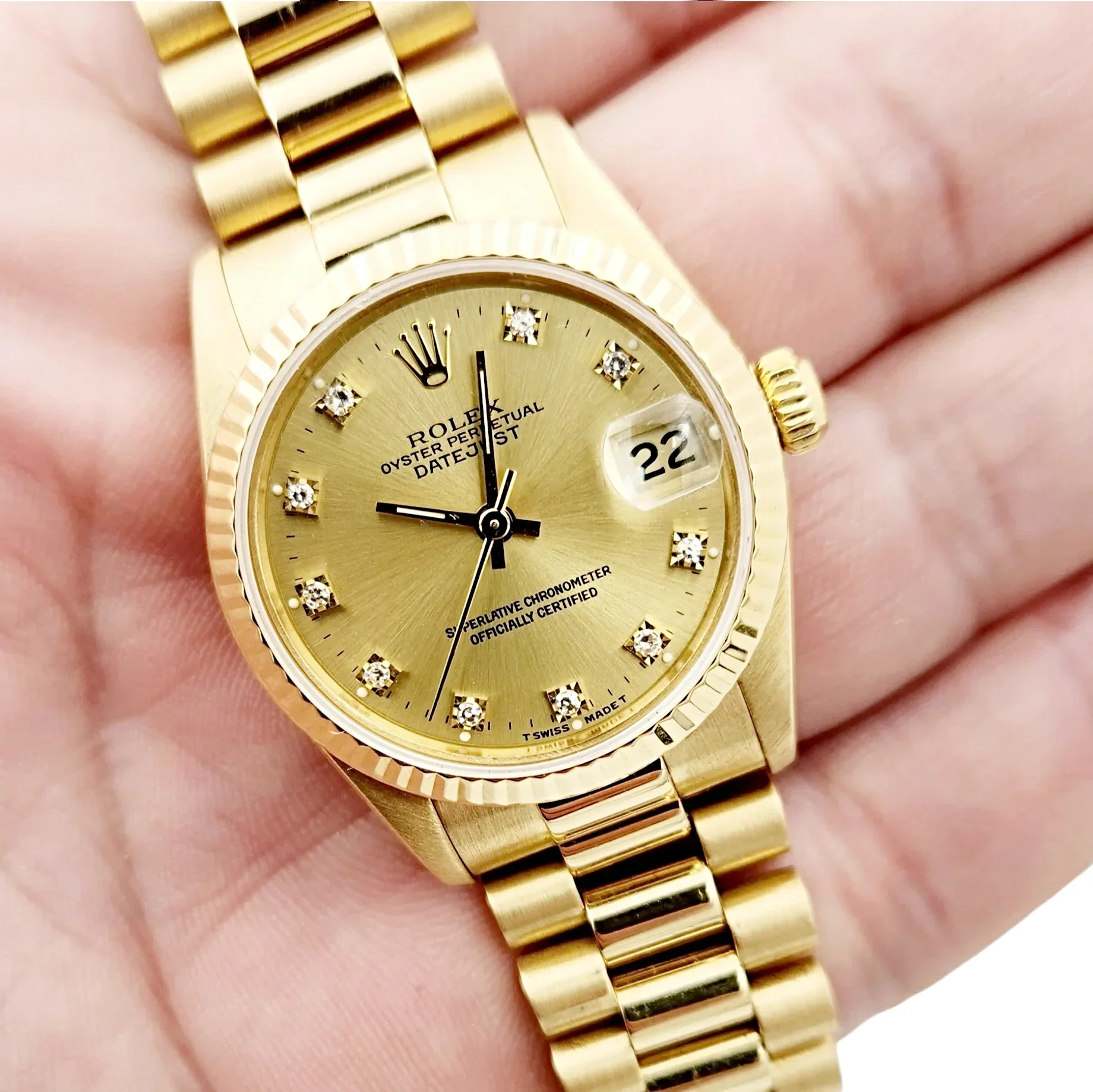 Ladies Rolex 31mm Midsize Presidential 18K Solid Yellow Gold Watch with Champagne Diamond Dial and Fluted Bezel. (Pre-Owned 68278)