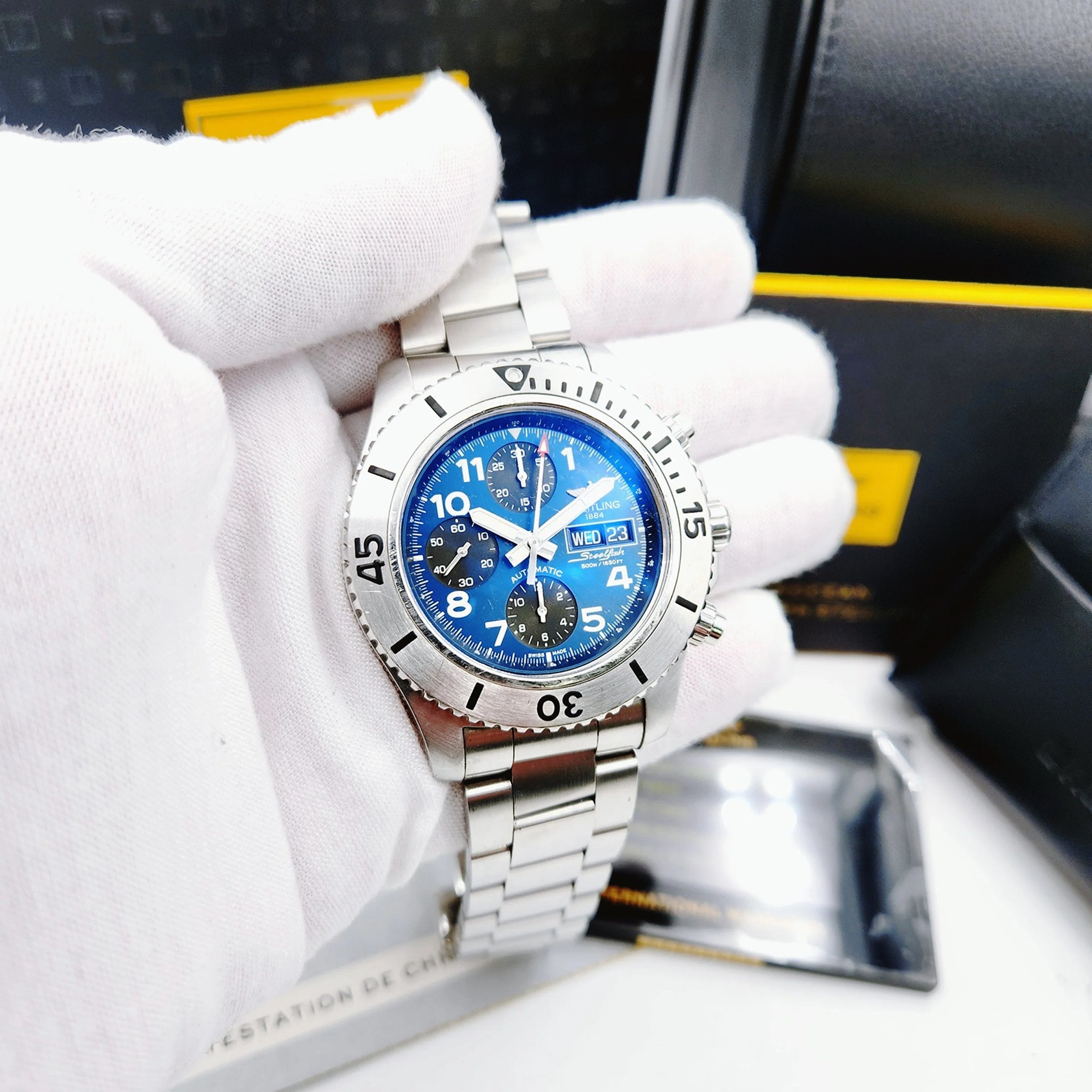 *Men's Breitling 44mm Superocean Automatic Stainless Steel Watch with Blue Chronograph Dial. (Pre-Owned A13341)