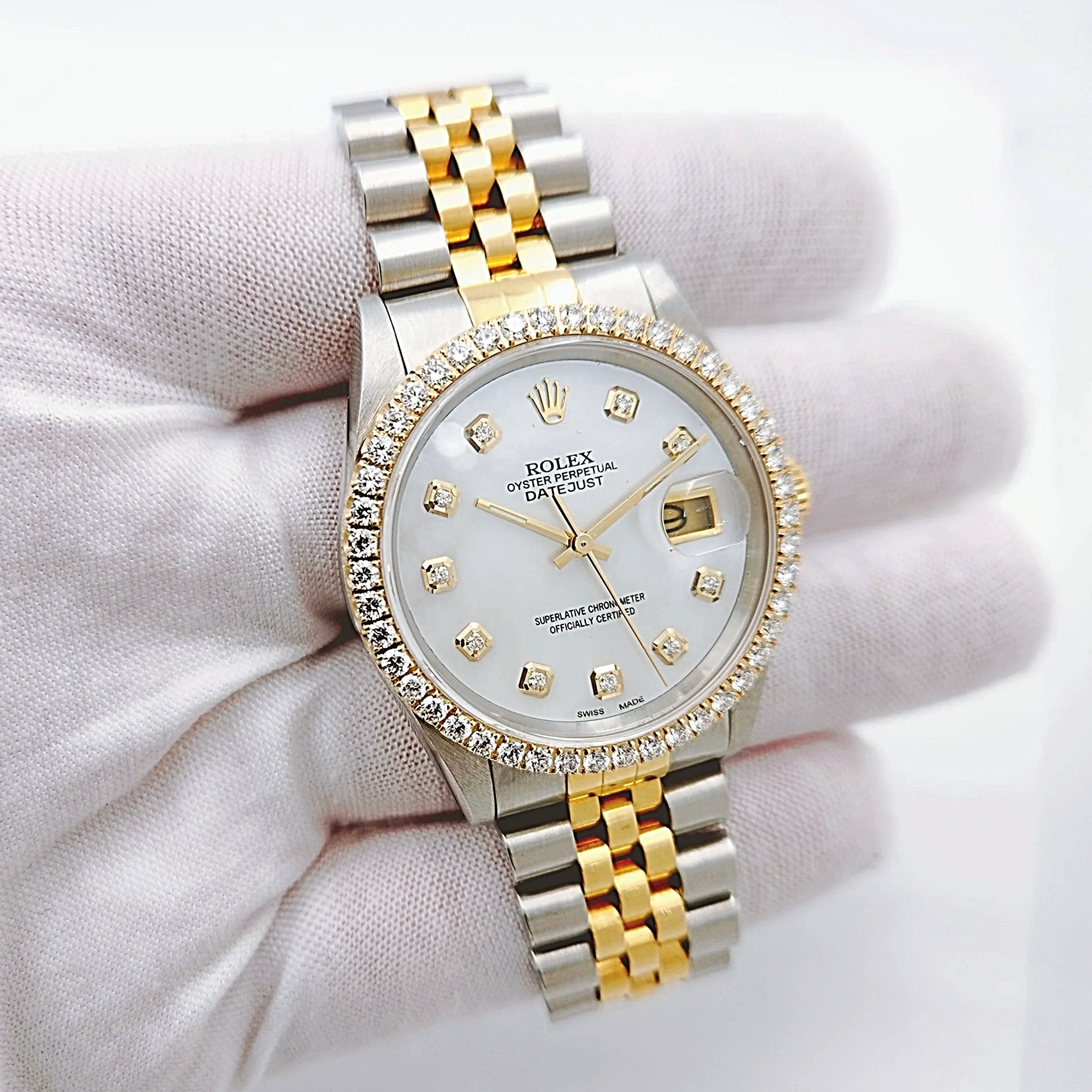 Men's Rolex 36mm DateJust 18K Gold / Stainless Steel Two Tone Watch with Mother of Pearl Diamond Dial and Diamond Bezel. (Pre-Owned 16233)
