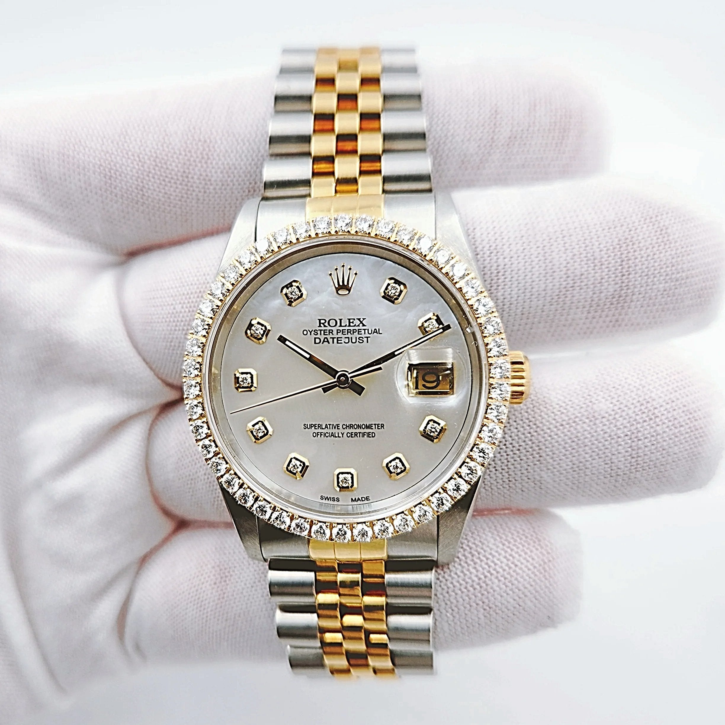 Men's Rolex 36mm DateJust 18K Gold / Stainless Steel Two Tone Wristwatch w/ Mother of Pearl Diamond Dial & Diamond Bezel. (Pre-Owned 16233)