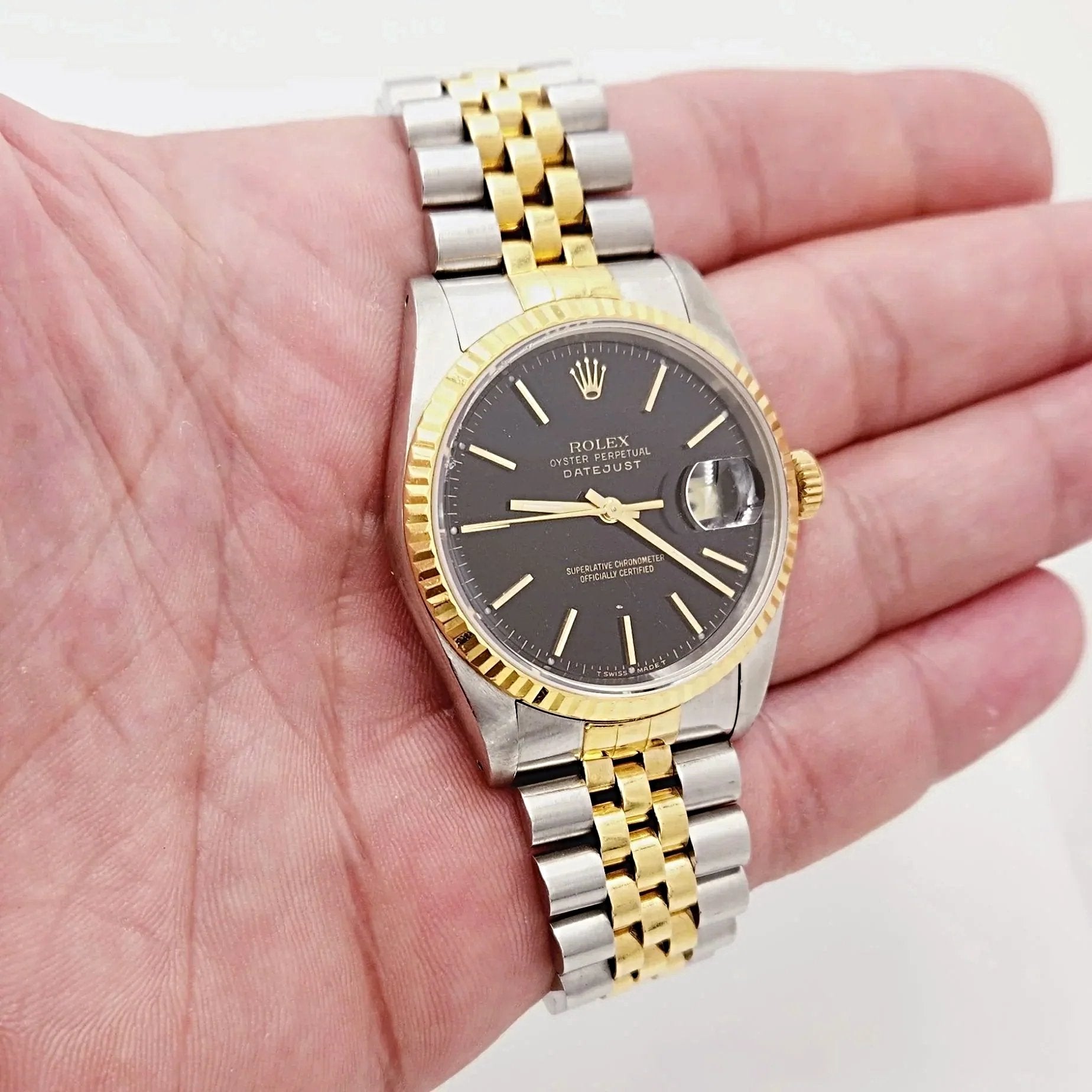Men's Rolex 36mm DateJust Two Tone 18K Yellow Gold / Stainless Steel Watch with Black Dial and Fluted Bezel. (Pre-Owned 16233)