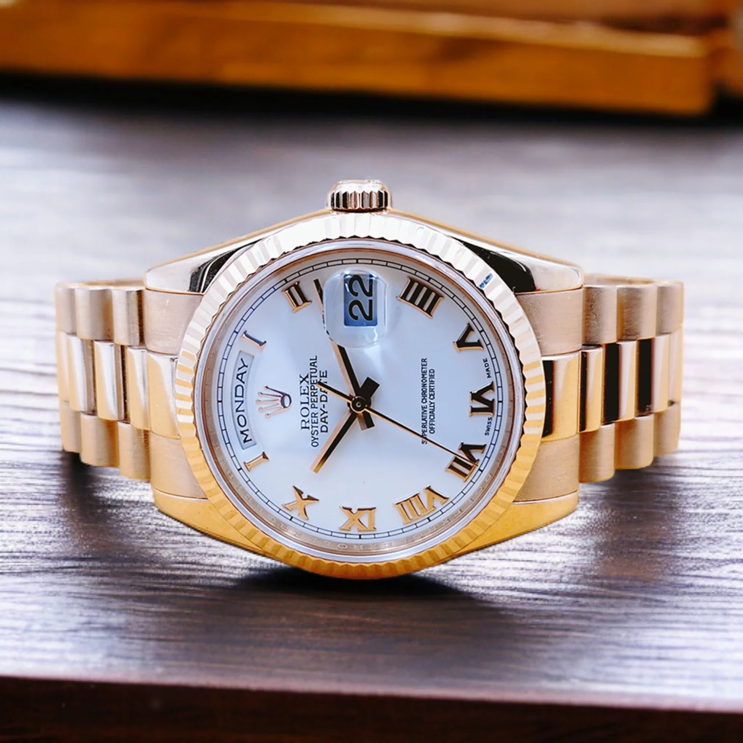 Men's Rolex 36mm Presidential 18K Rose Gold Watch with White Roman Numeral Dial and Fluted Bezel. (Pre-Owned 118235)