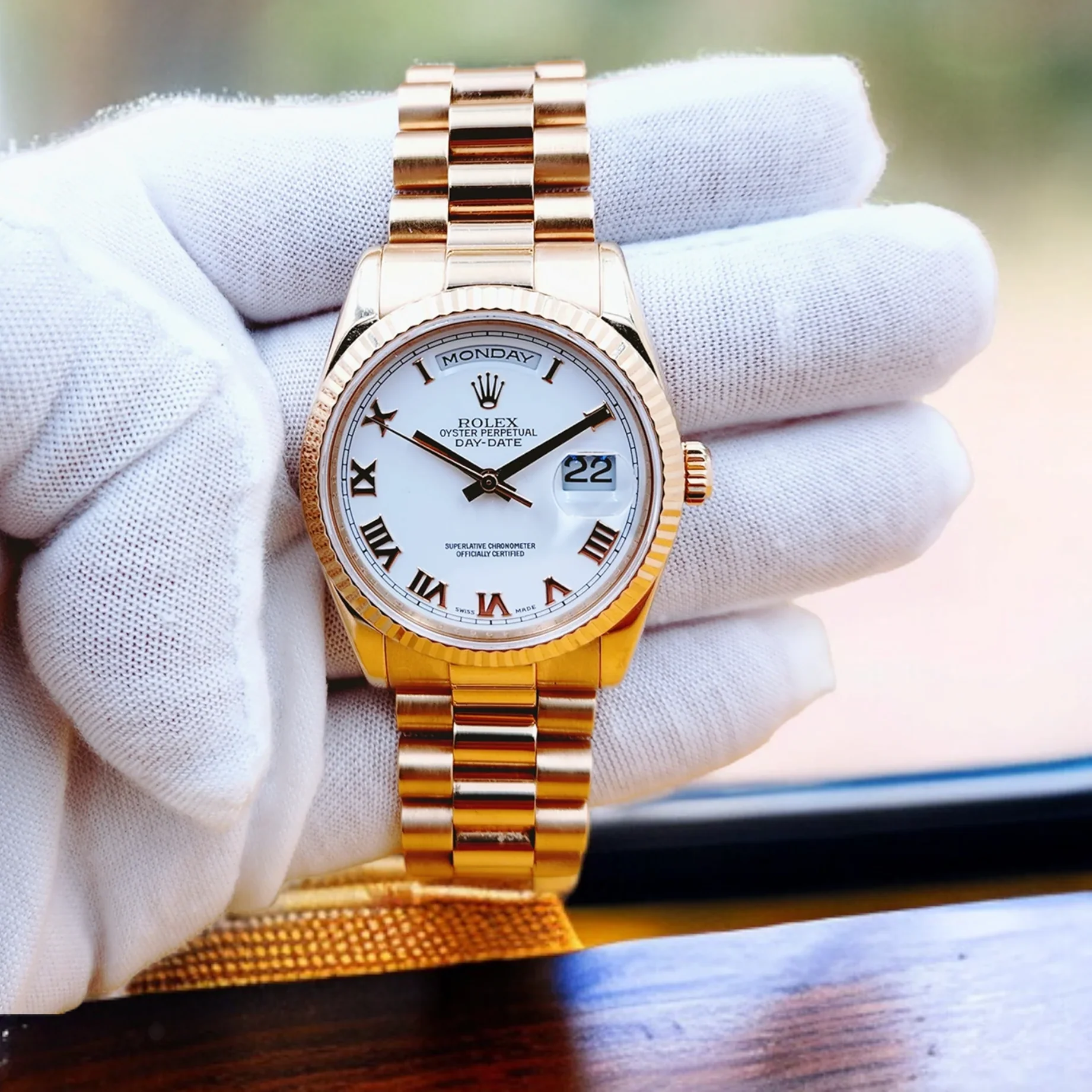 Men's Rolex 36mm Presidential 18K Rose Gold Watch with White Roman Numeral Dial and Fluted Bezel. (Pre-Owned 118235)