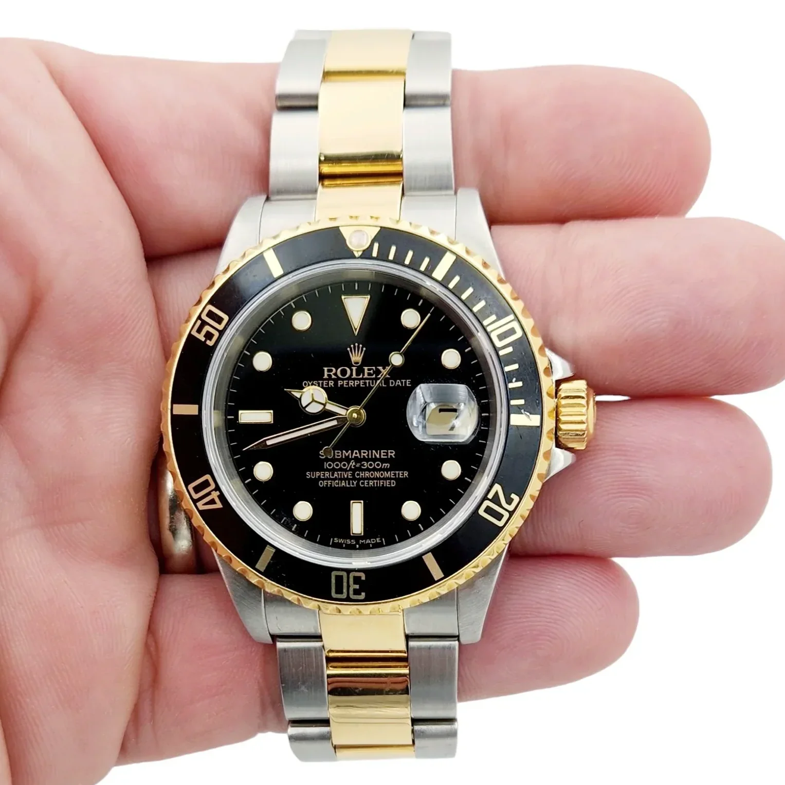 Men's Rolex 40mm Submariner Oyster Perpetual Two Tone 18K Yellow Gold / Stainless Steel Watch with Black Dial and Black Bezel. (Pre-Owned 16613)
