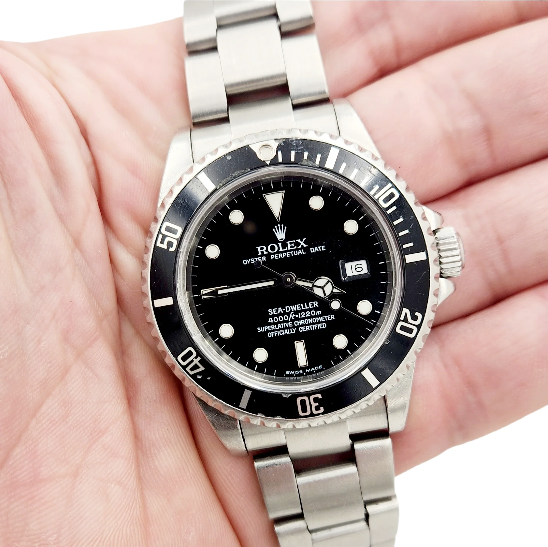 Men's Rolex 40mm Vintage 1982 Sea-Dweller Stainless Steel Watch with Black Dial and Fluted Bezel. (Pre-Owned 16660)