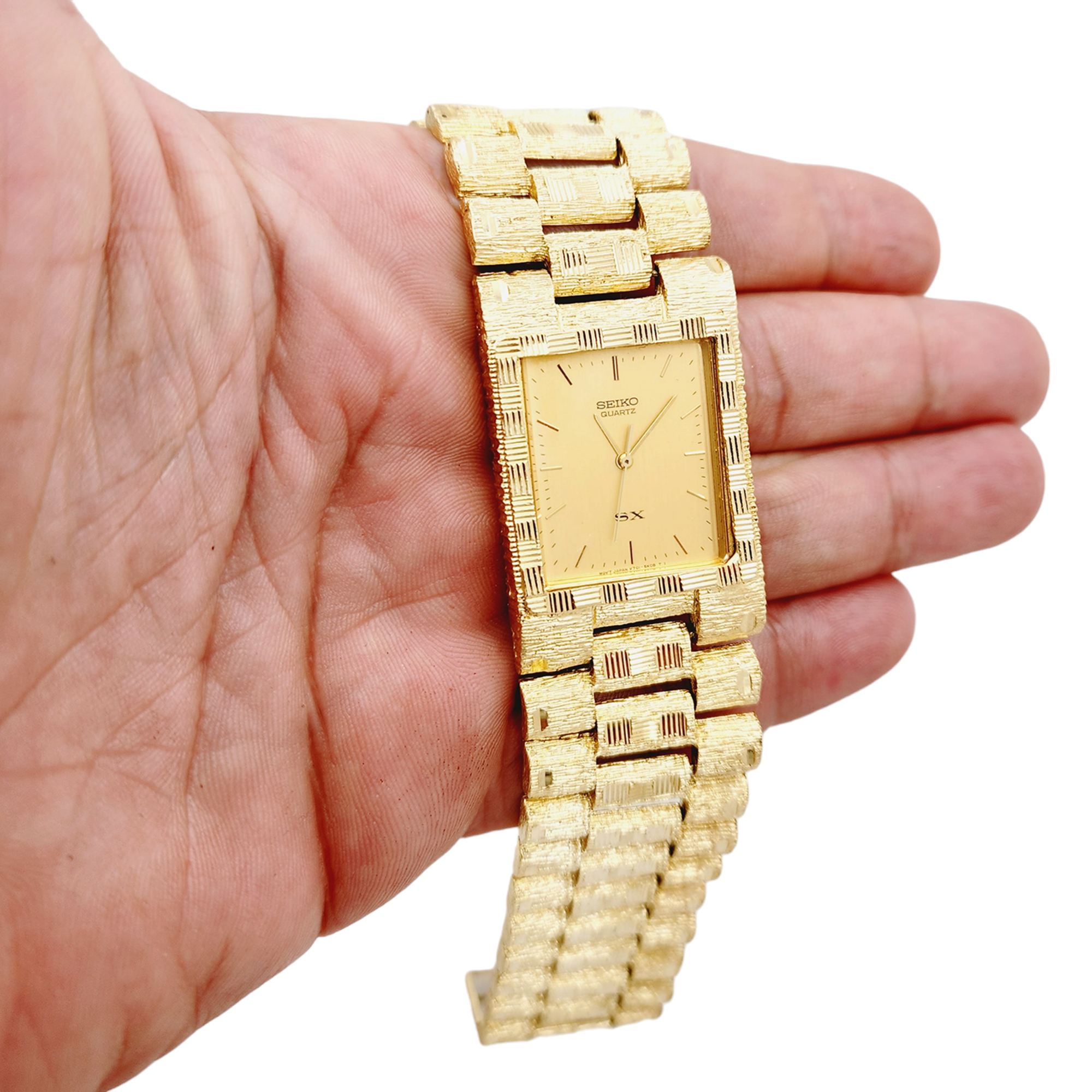 Men's Seiko SX 28mm x 42mm Vintage 14K Yellow Gold Watch with Champagne Dial. (Pre-Owned V701-5K00)