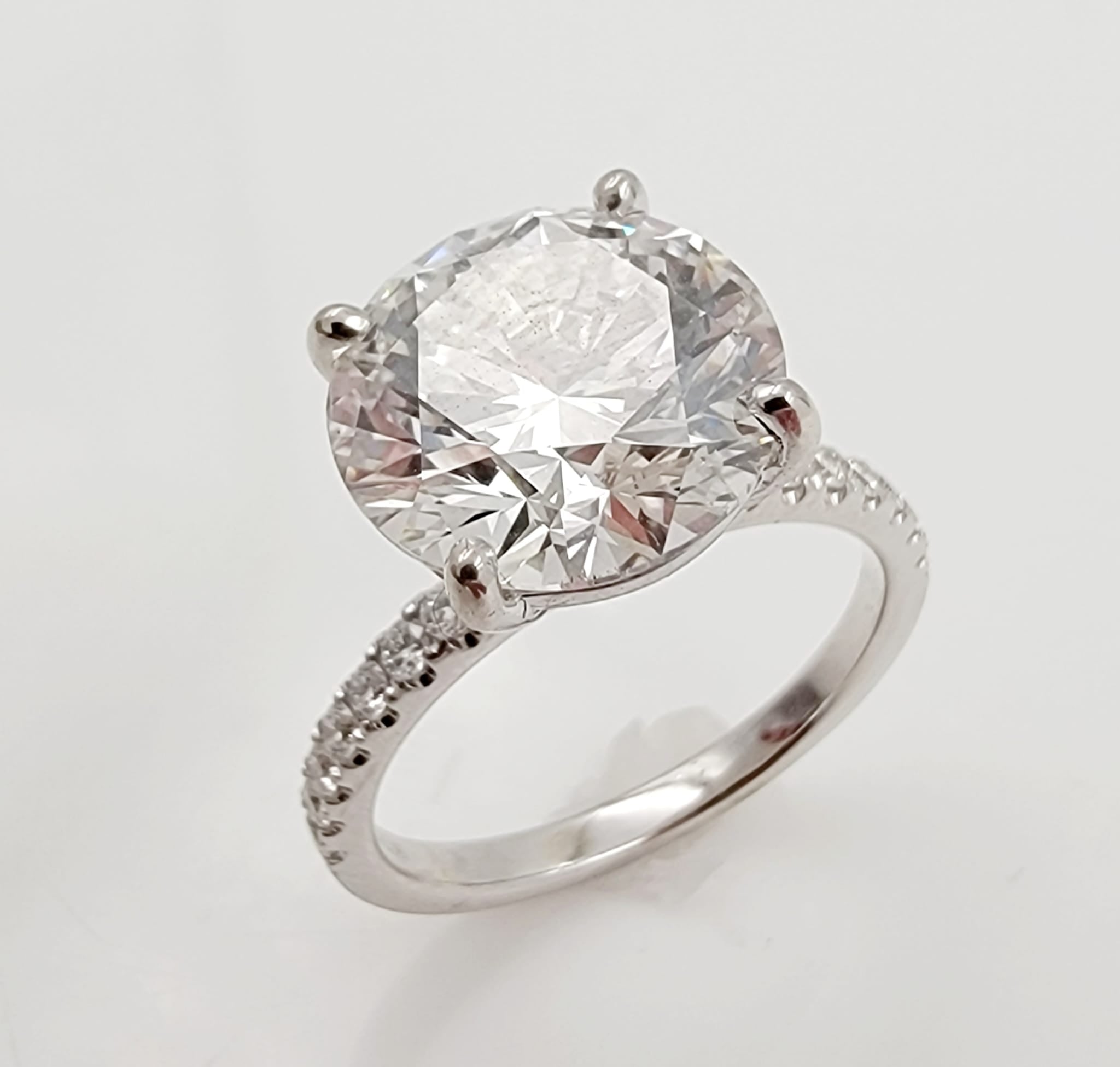 18k White Gold Solitaire Ring with Lab Grown Center diamond.