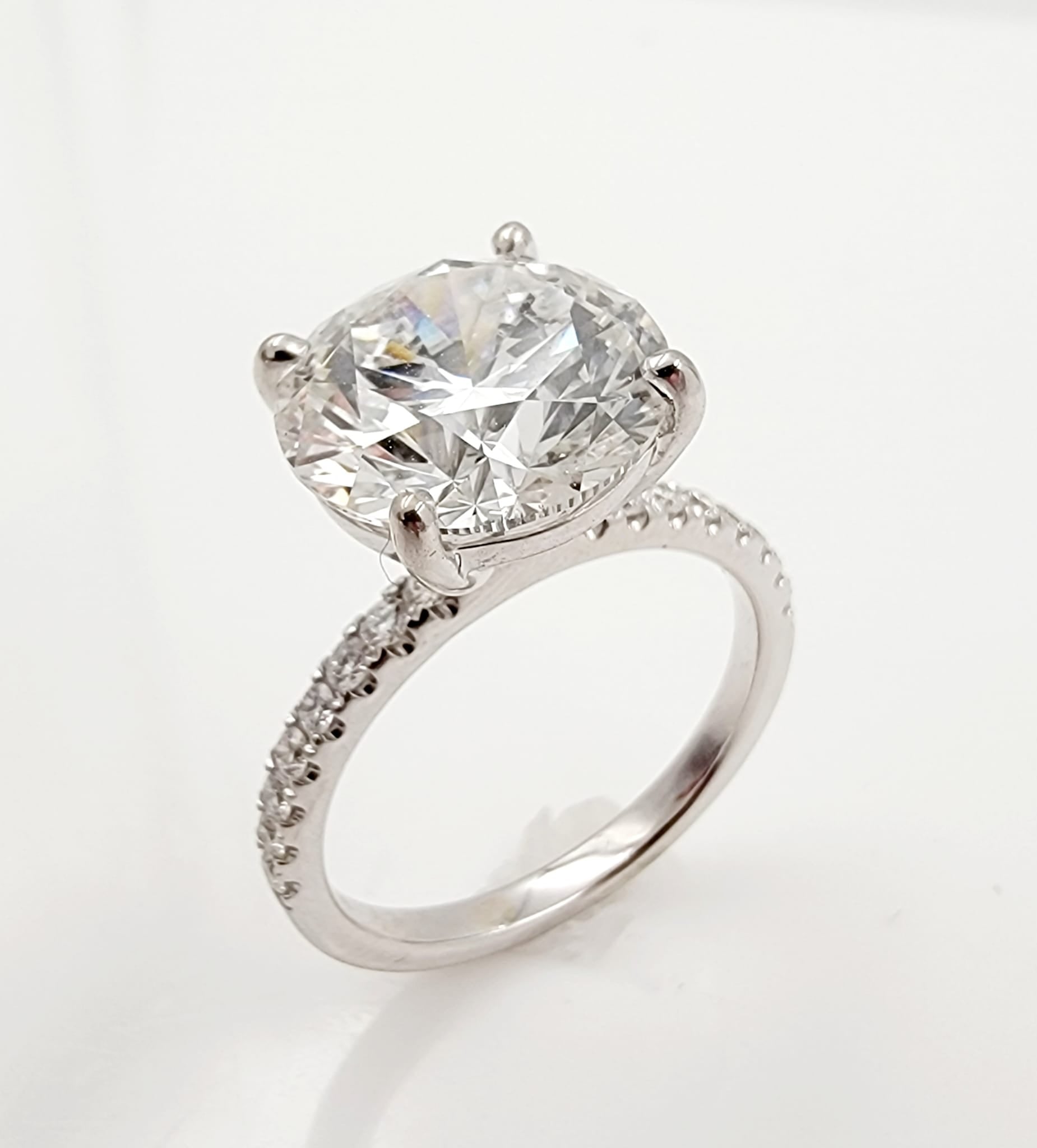 18k White Gold Solitaire Ring with Lab Grown Center diamond.