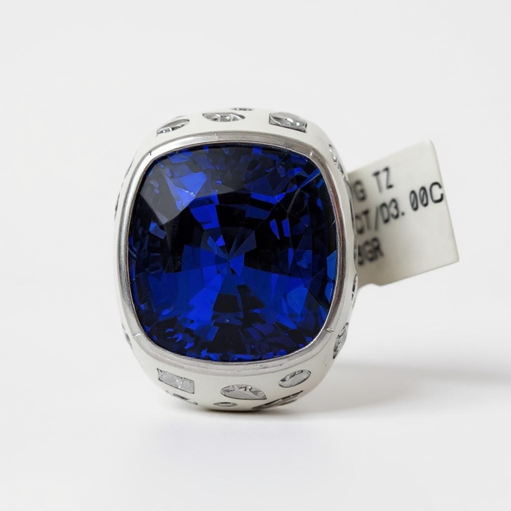 Channel 18k White Gold Tanzanite and Diamond Ring.