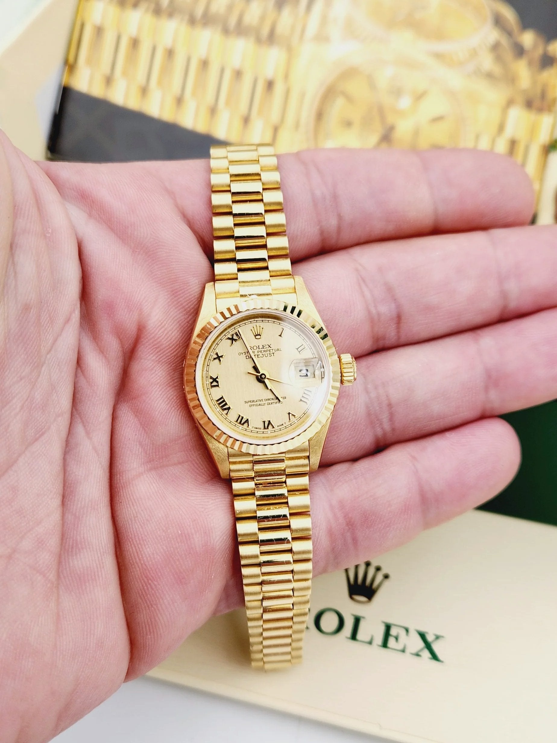 Ladies Rolex 26mm Presidential 18K Yellow Gold Wristwatch w/ Gold Dial & Fluted Bezel. (UNWORN 69178)