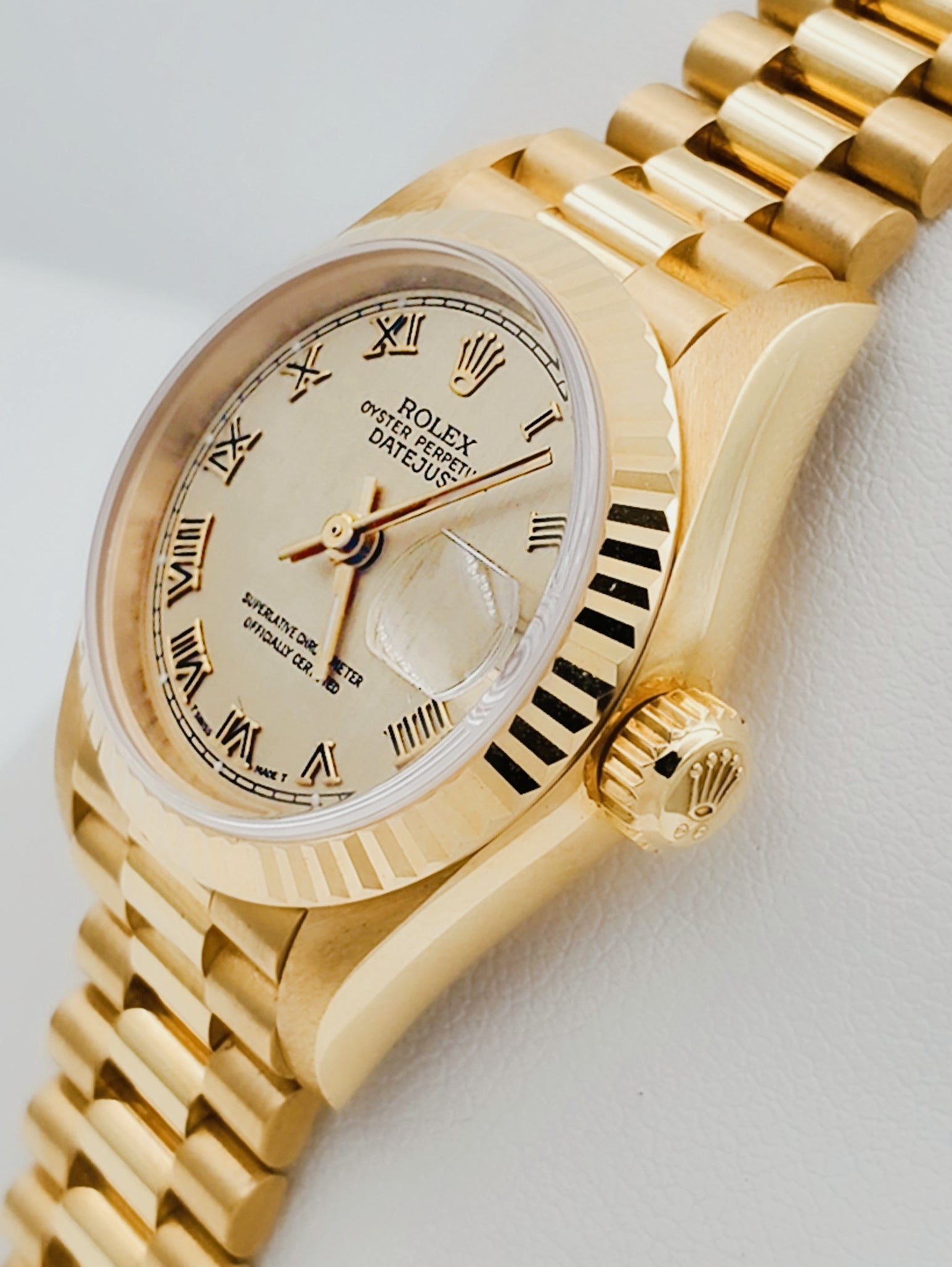Ladies Rolex 26mm Presidential 18K Yellow Gold Watch with Gold Dial and Fluted Bezel. (NEW 69178)