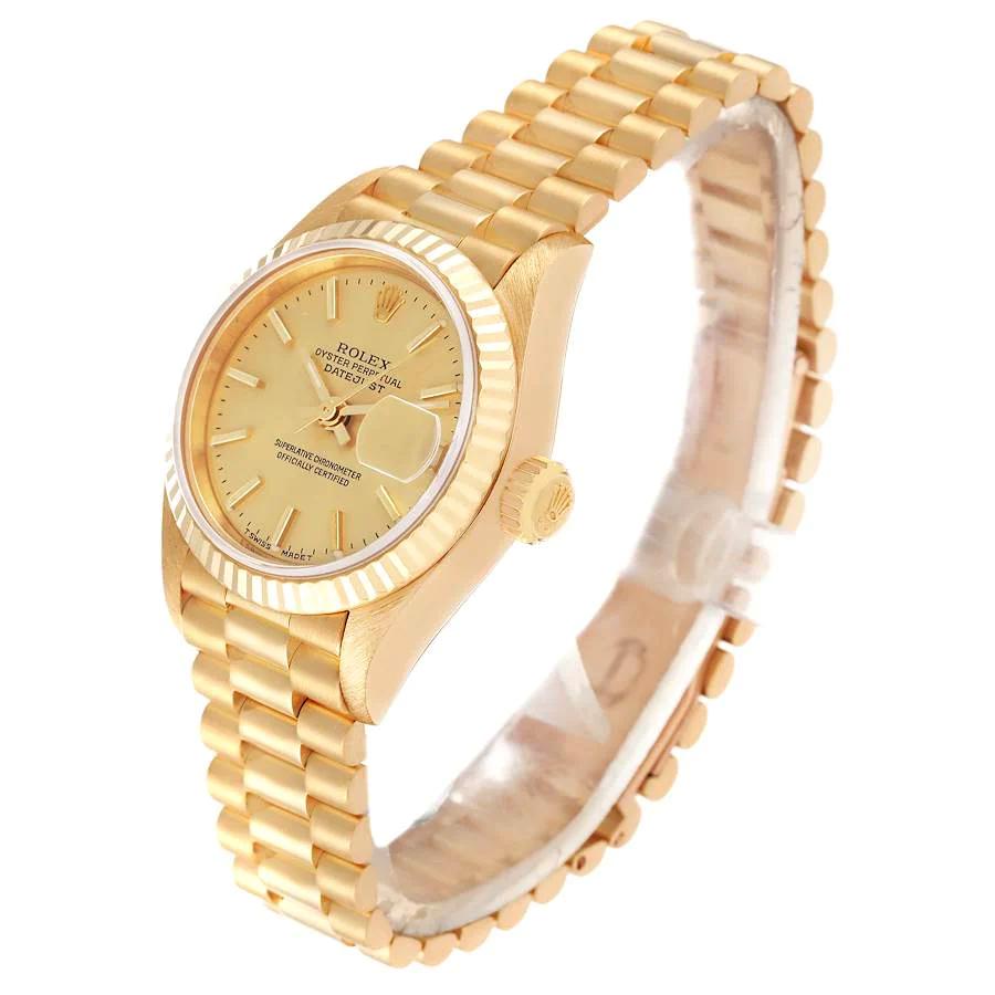 Ladies Rolex 26mm Presidential 18K Yellow Gold Watch with Gold Dial and Fluted Bezel. (Pre-Owned 69178)