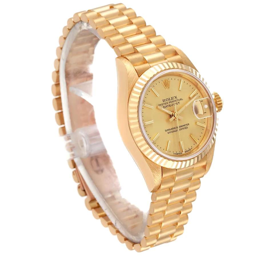Ladies Rolex 26mm Presidential 18K Yellow Gold Watch with Gold Dial and Fluted Bezel. (Pre-Owned 69178)