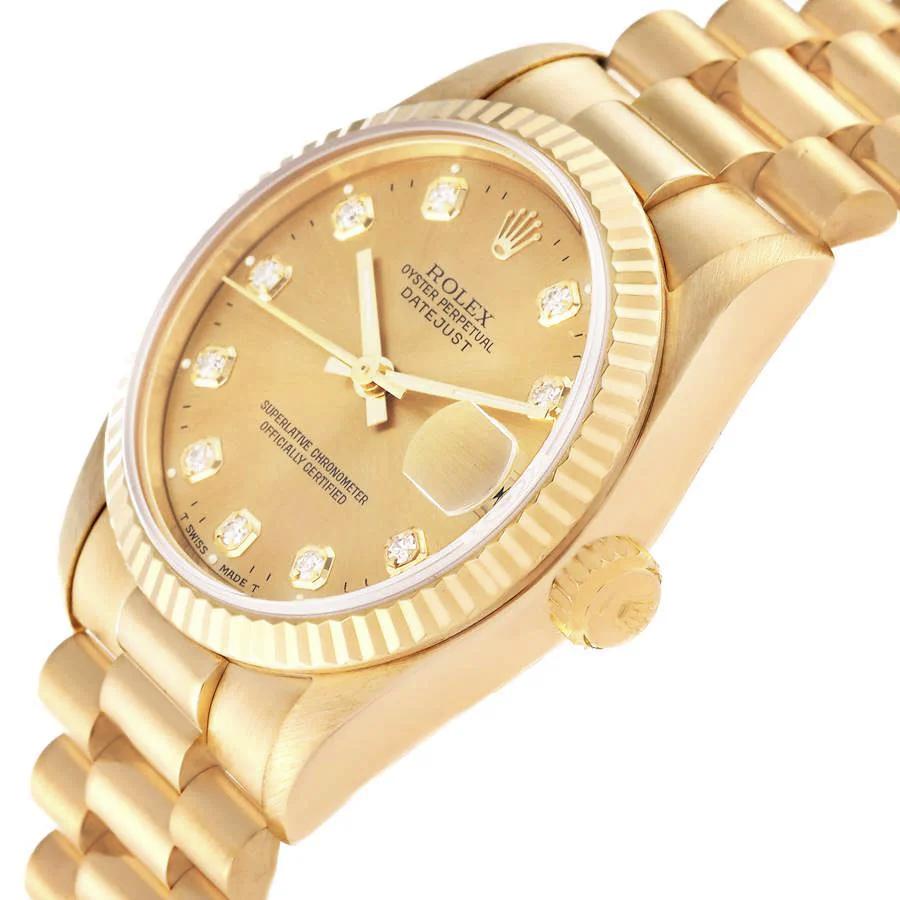 Ladies Rolex 31mm Midsize Presidential 18K Solid Yellow Gold Watch with Champagne Diamond Dial and Fluted Bezel. (Pre-Owned)