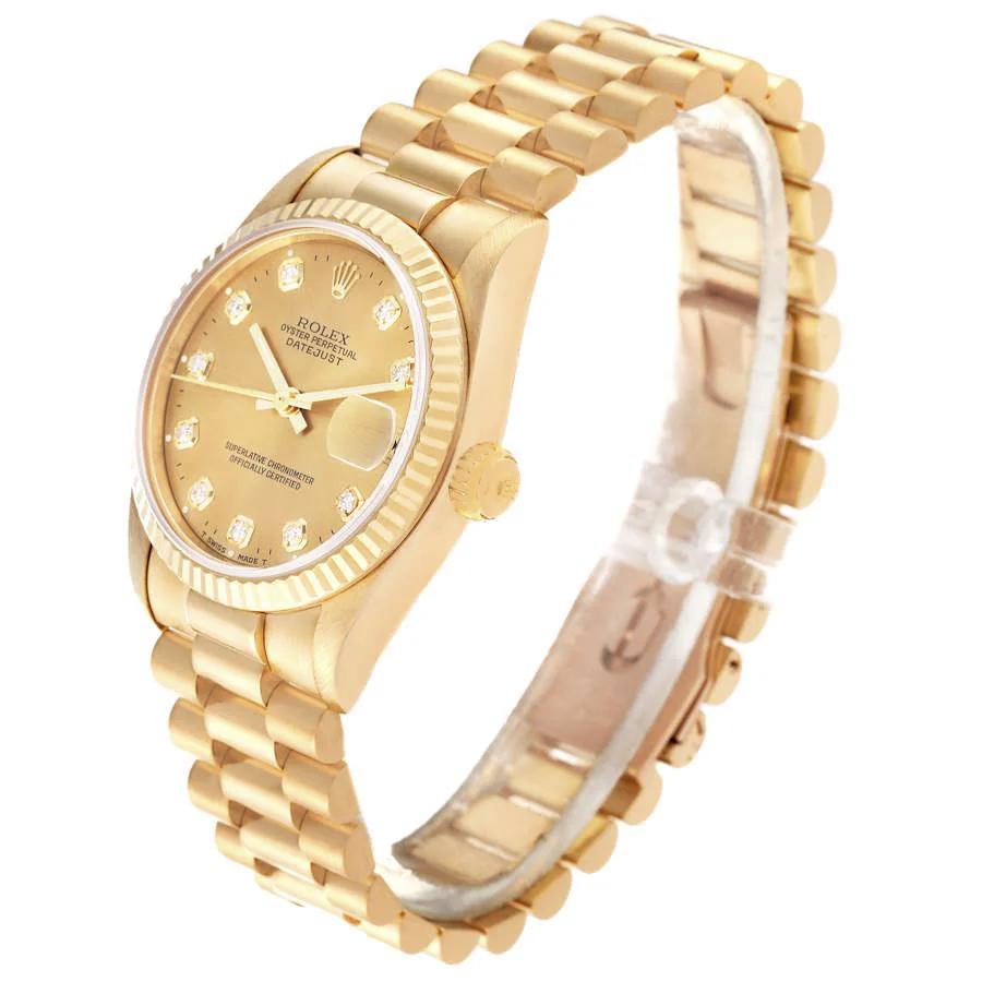 Ladies Rolex 31mm Midsize Presidential 18K Solid Yellow Gold Watch with Champagne Diamond Dial and Fluted Bezel. (Pre-Owned)