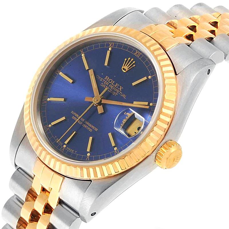 Ladies Rolex Midsize 31mm DateJust Two Tone 18K Yellow Gold / Stainless Steel Watch with Blue Dial and Fluted Bezel. (Pre-Owned 68273)