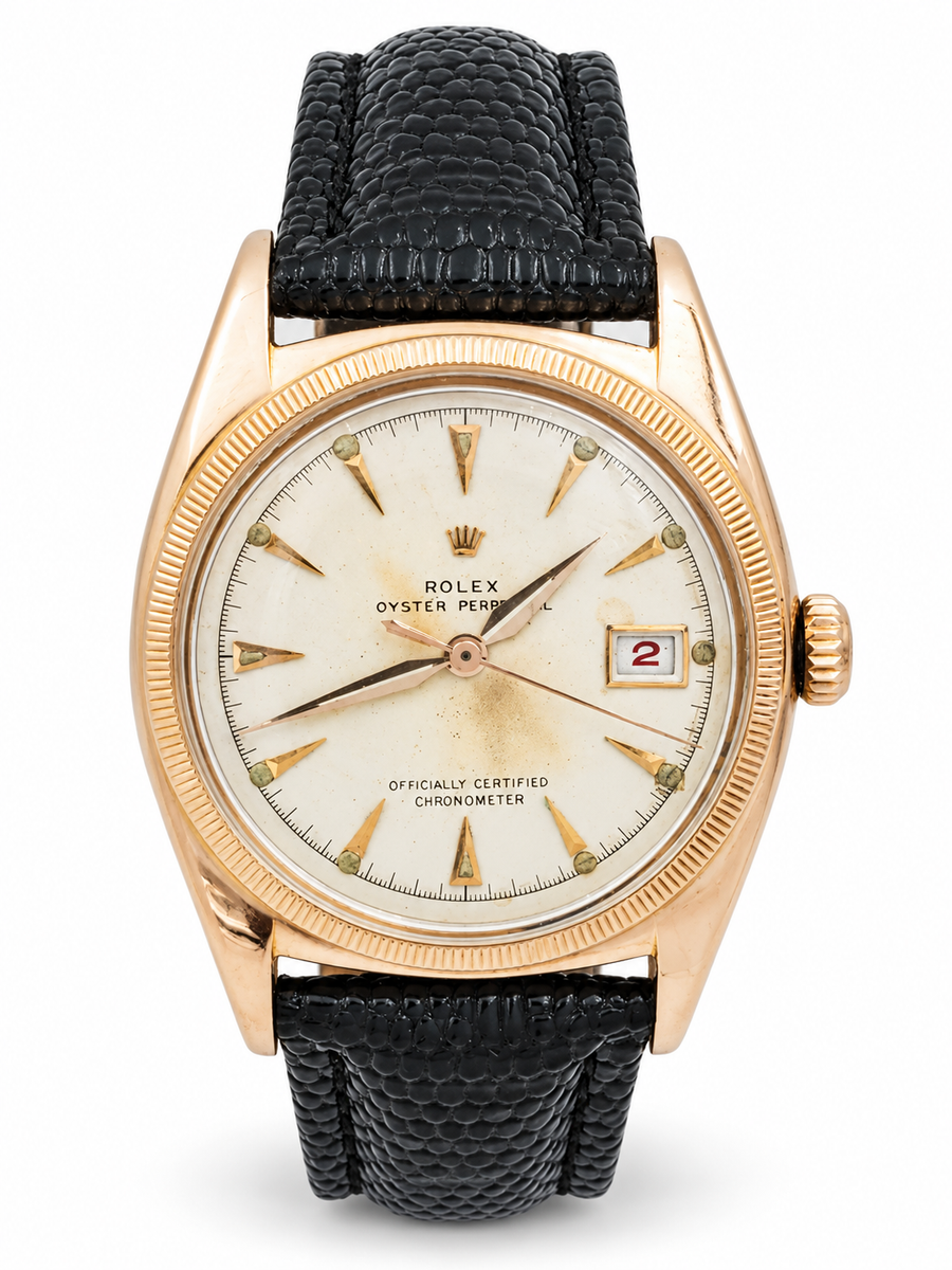 *1950 Men's Rolex 36mm Vintage Bubbleback Oyster Perpetual Rose Gold Watch with Cream Dial and Black Leather Strap. (Pre-Owned 6075)