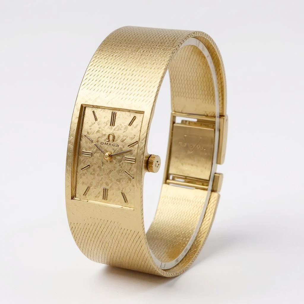 Unisex Omega Vintage 14K Yellow Gold Watch with Mesh Band and Gold Dial. (Pre-Owned)
