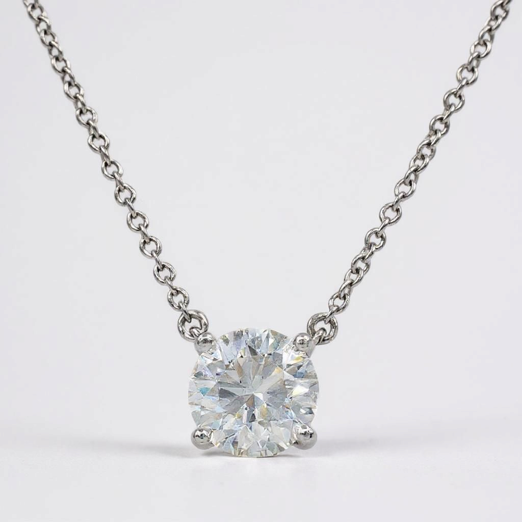 Tiffany & Co. 0.91 Carat Round VS1 / H Diamond Pendant with Platinum 16" Solitaire Necklace. (Pre-Owned)