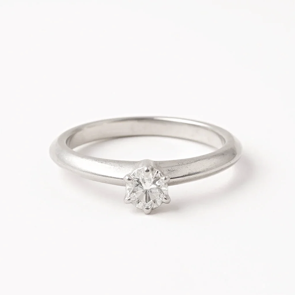 Tiffany & Co. Solitaire Round Cut 0.22 Ct. Diamond I Color, VS2 Clarity Platinum Engagement Ring. (Pre-Owned)