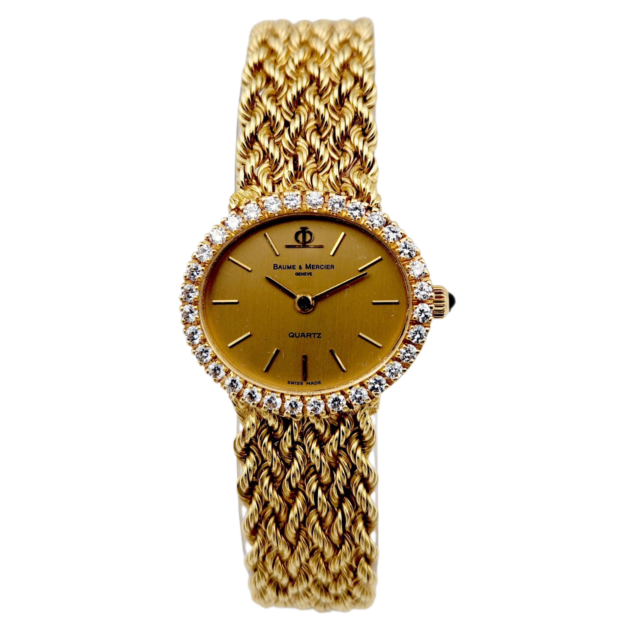 Ladies Baume & Mercier 24mm Vintage 18K Yellow Gold Watch with Gold Dial and Diamond Bezel. (Pre-Owned)