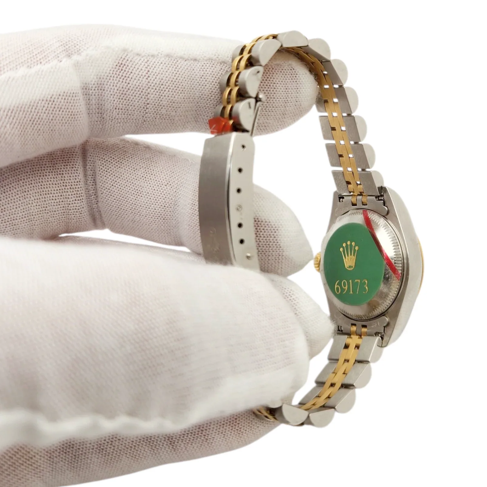 Ladies Rolex 26mm Datejust Two Tone 18K Yellow Gold / Stainless Steel Watch with Ivory Pyramid Dial and Fluted Bezel. (UNWORN 69173)