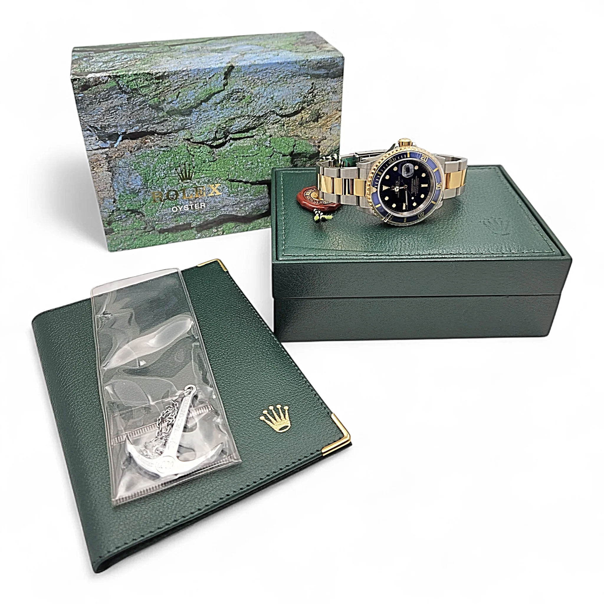 2005 Men's Rolex 40mm Submariner Oyster Perpetual Two Tone 18K Yellow Gold / Stainless Steel Watch with Blue Dial and Blue Bezel. (UNWORN 16613)