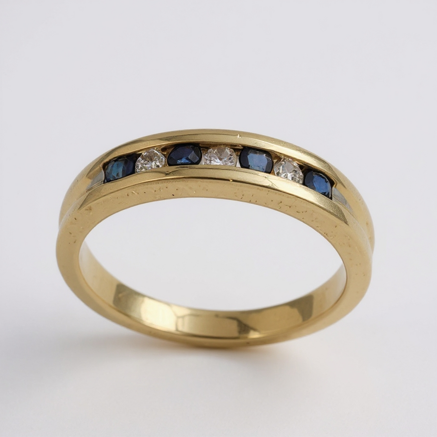 Estate Jewelry 14K Yellow Gold with Ring With 3 Diamonds and 4 Sapphires. (Size 6.50)