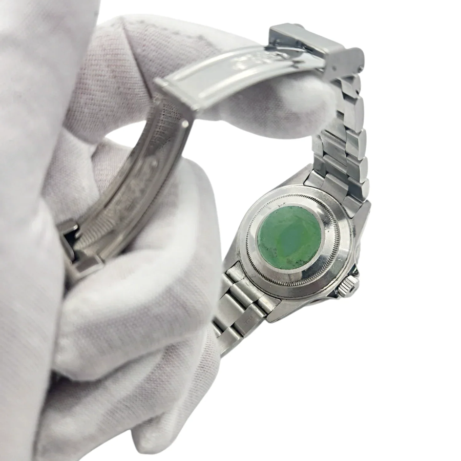 2000 Men's Rolex 40mm Submariner Oyster Perpetual Date Stainless Steel Watch with Black Dial and Black Bezel. (Pre-Owned 16610)