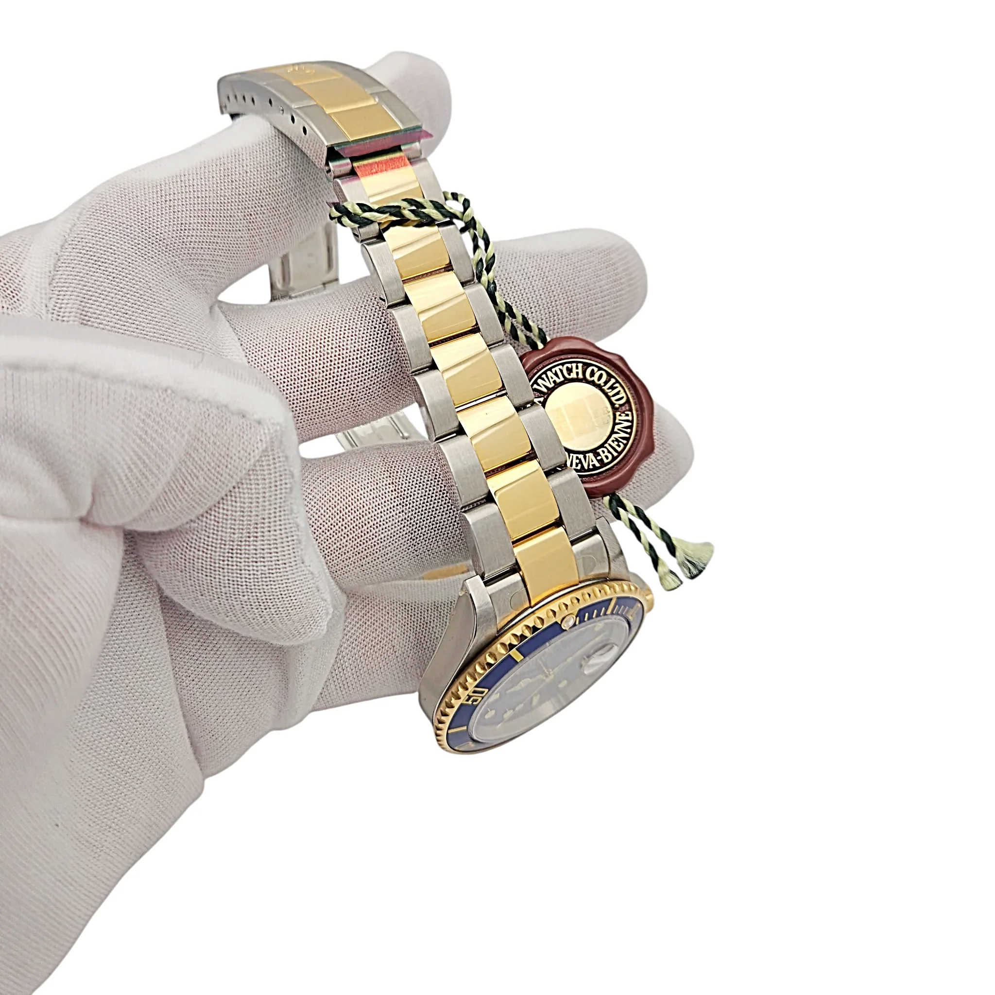 2005 Men's Rolex 40mm Submariner Oyster Perpetual Two Tone 18K Yellow Gold / Stainless Steel Watch with Blue Dial and Blue Bezel. (UNWORN 16613)