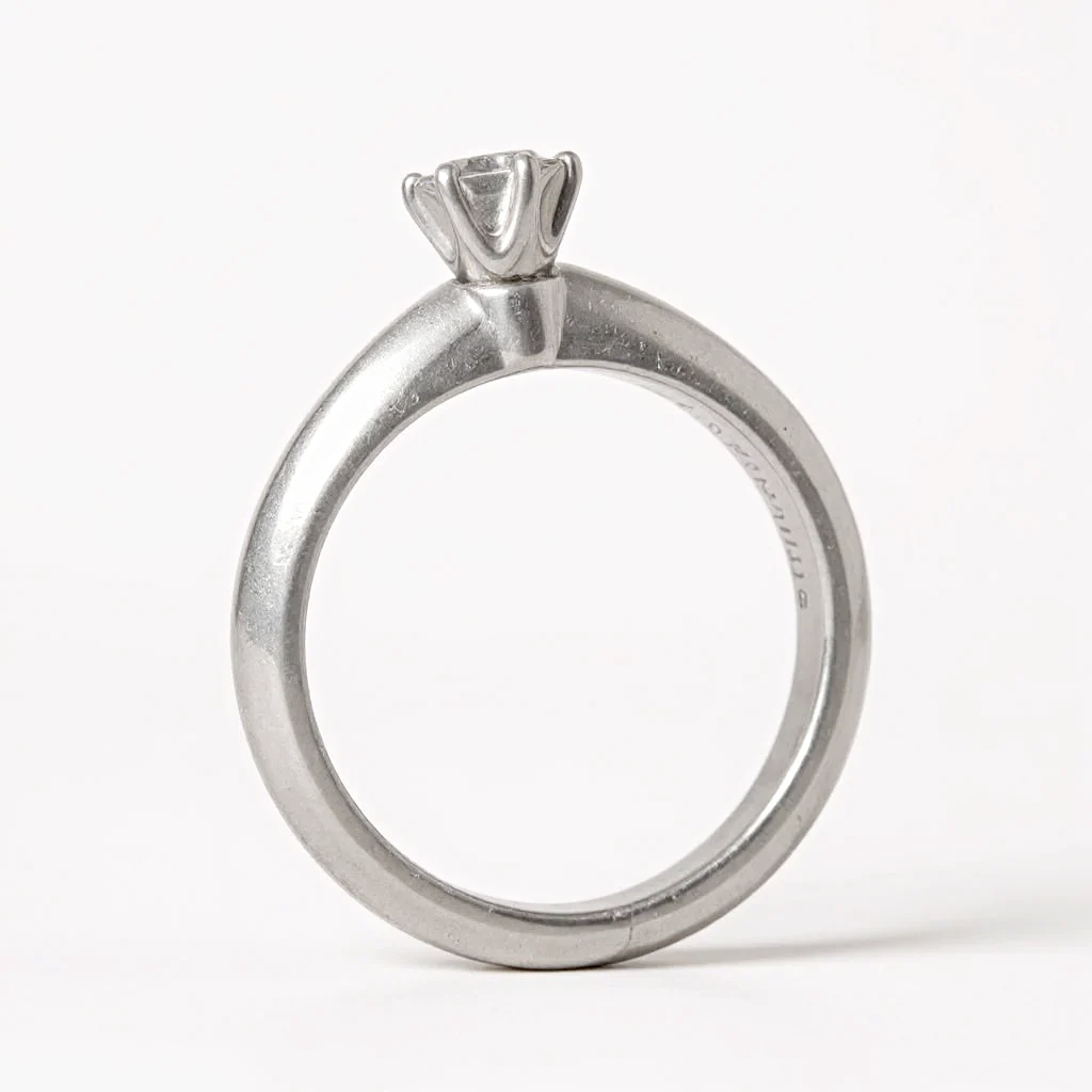 Tiffany & Co. Solitaire Round Cut 0.22 Ct. Diamond I Color, VS2 Clarity Platinum Engagement Ring. (Pre-Owned)