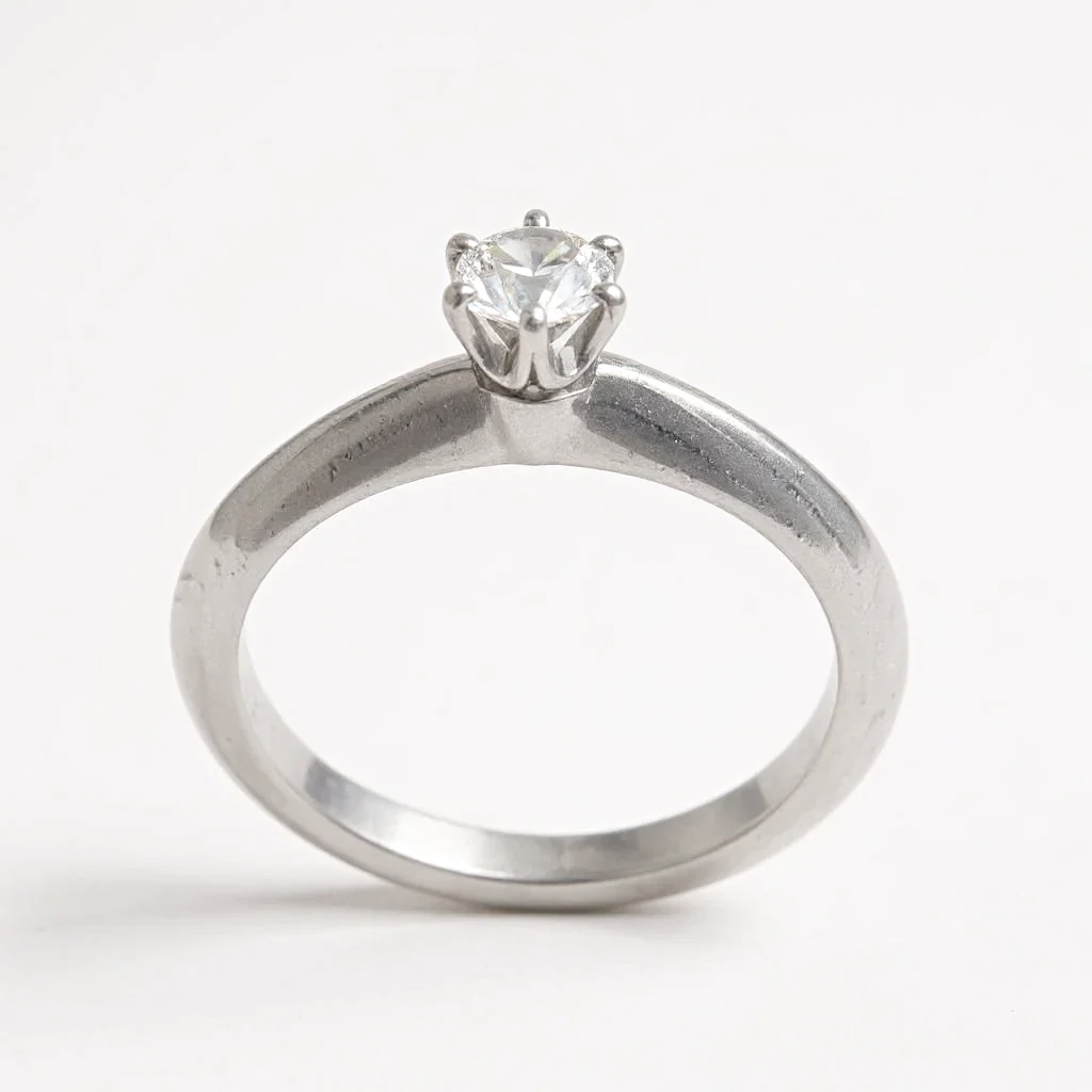 Tiffany & Co. Solitaire Round Cut 0.22 Ct. Diamond I Color, VS2 Clarity Platinum Engagement Ring. (Pre-Owned)