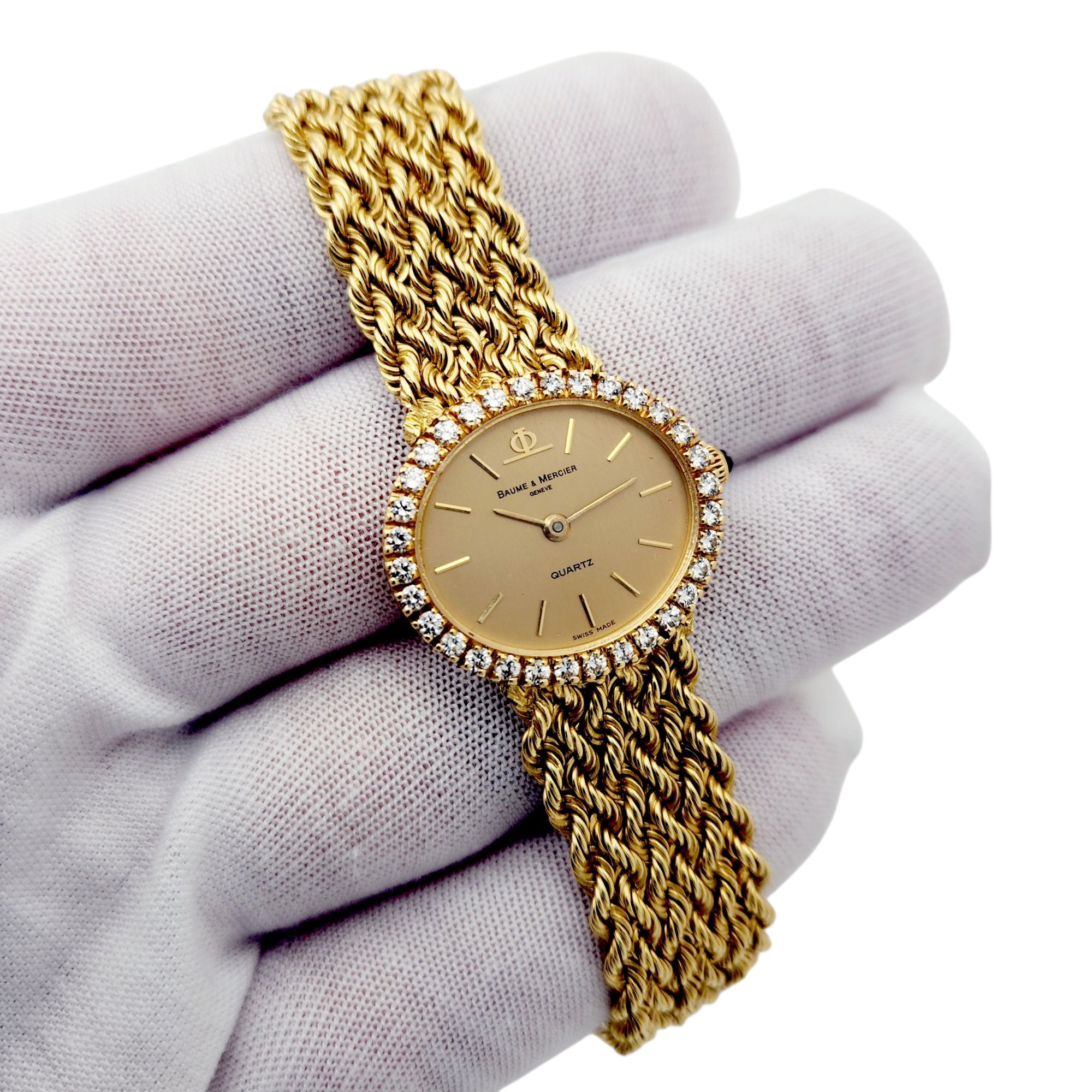 Ladies Baume & Mercier 24mm Vintage 18K Yellow Gold Watch with Gold Dial and Diamond Bezel. (Pre-Owned)